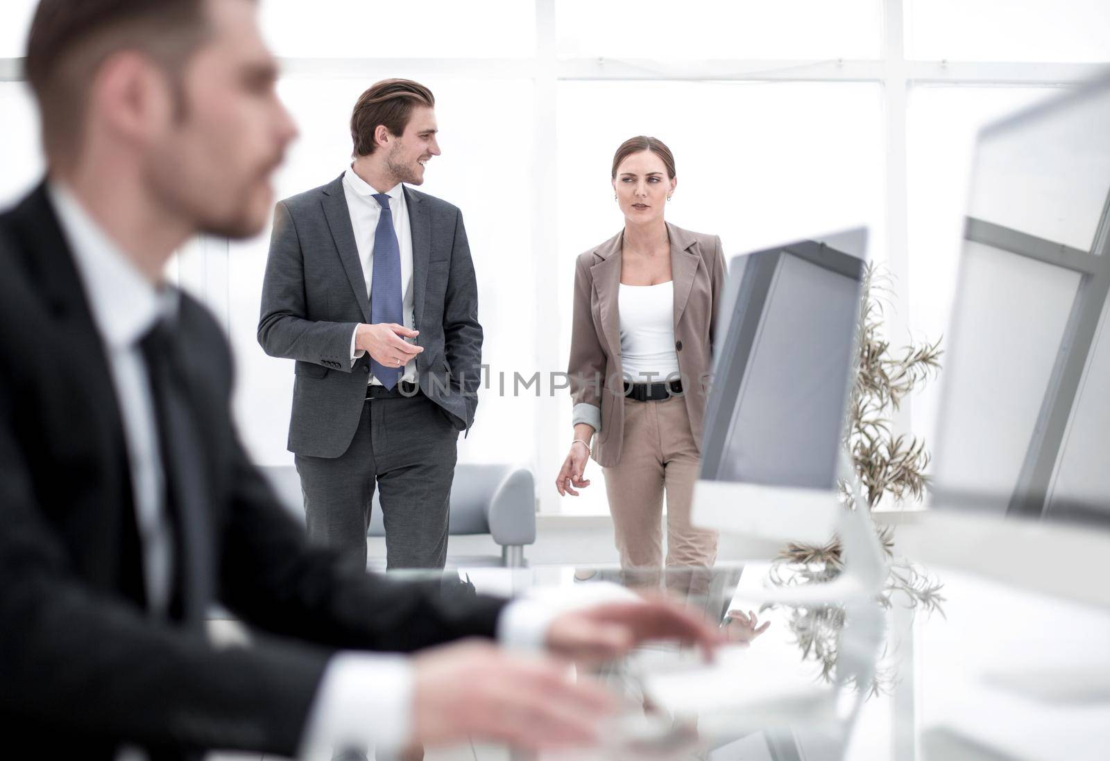 employees in a modern banking office. photo with copy space