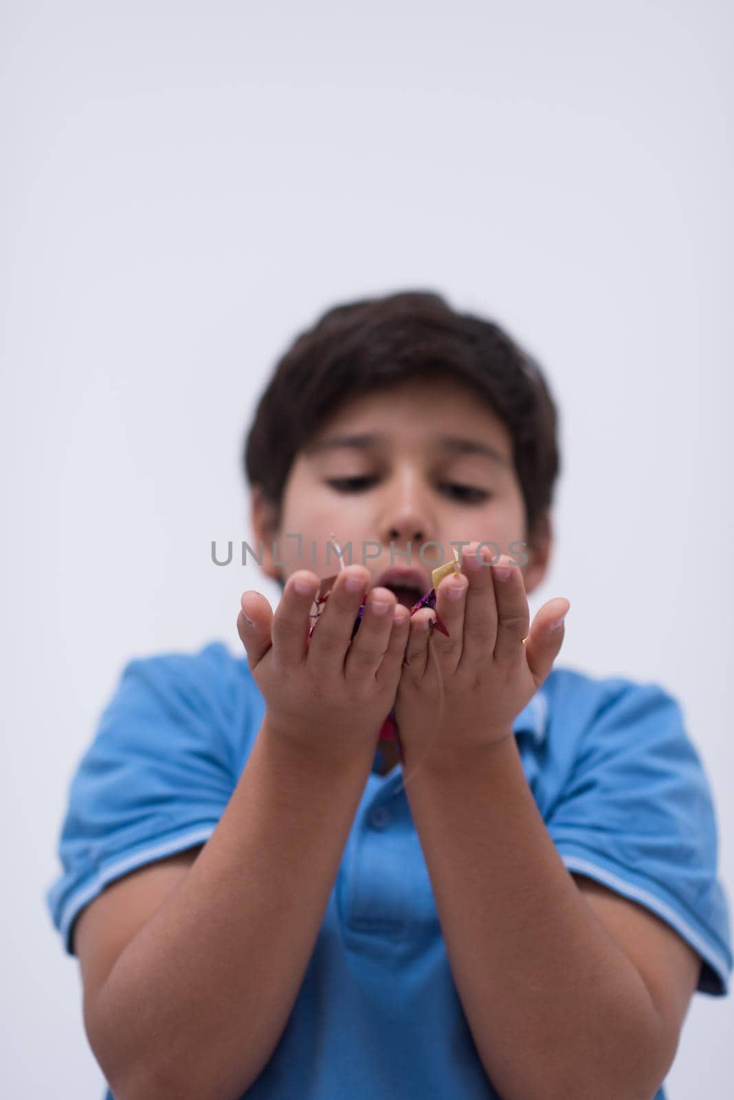 kid blowing confetti by dotshock