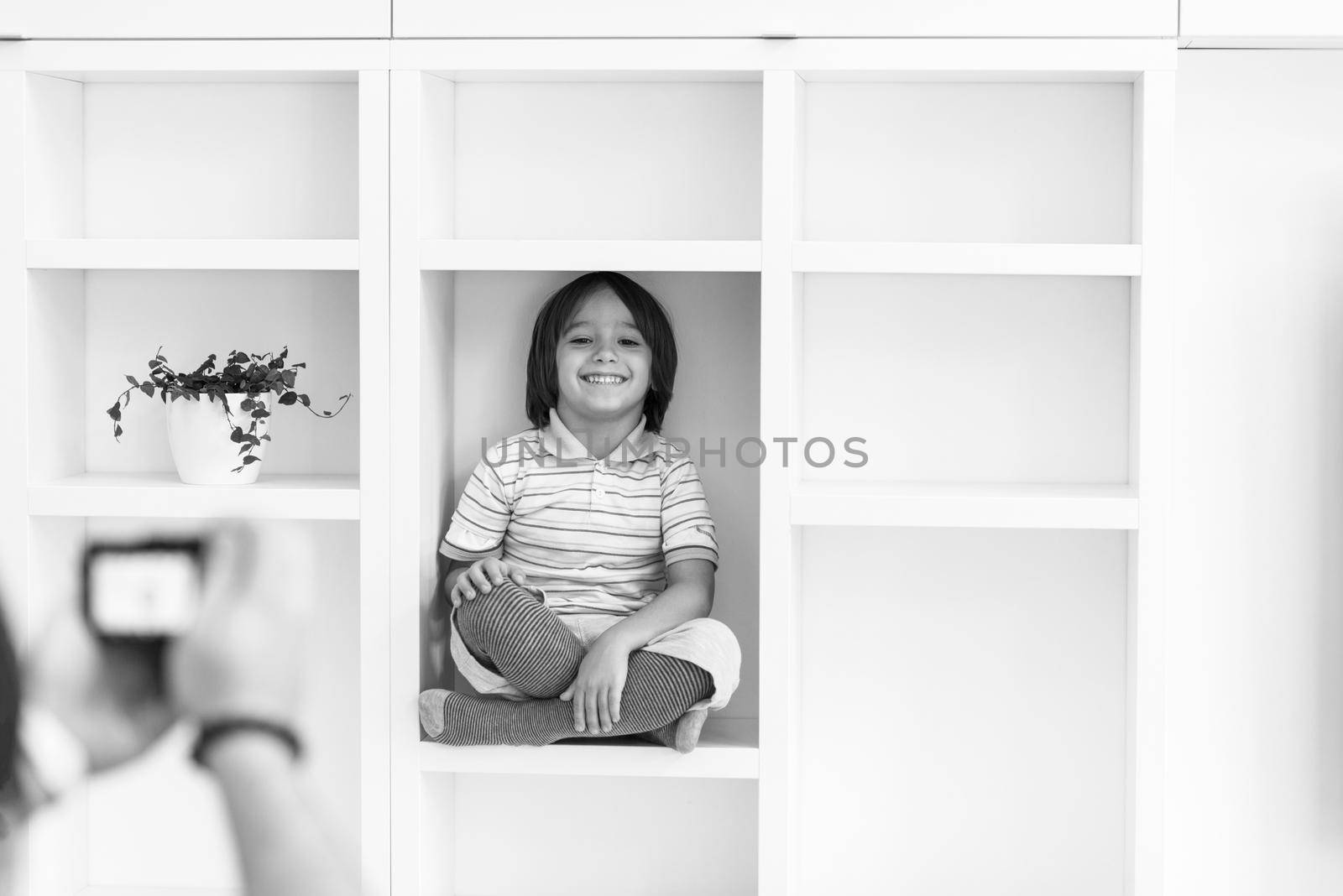 Photoshooting with kid model at studio as new modern home