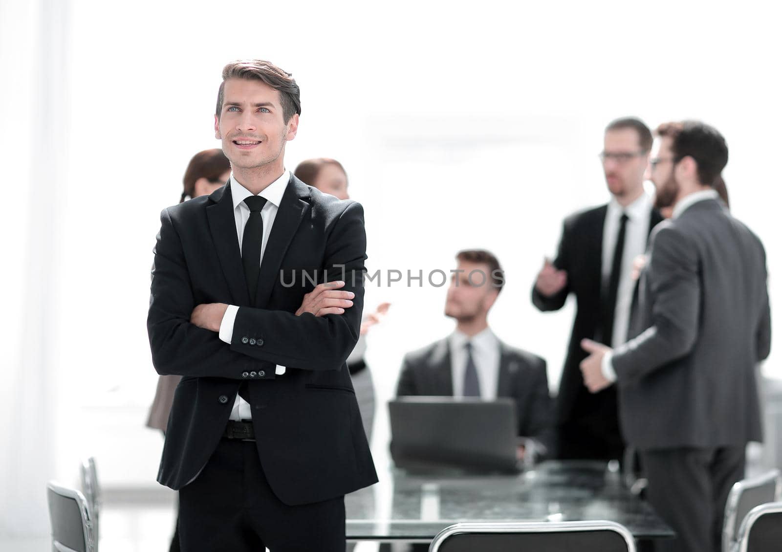dreaming businessman on the background of the office.photo with copy space