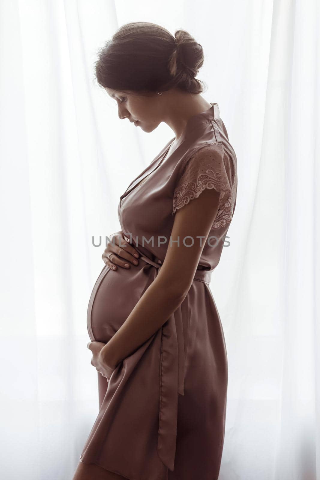 Silhouette of pregnant woman, window by Demkat