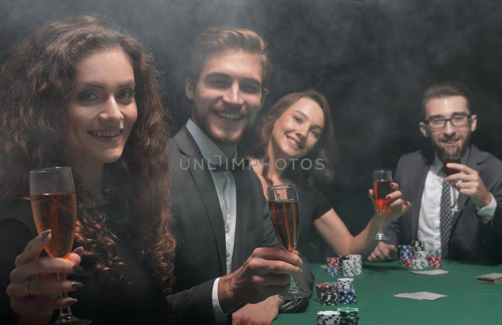 poker players sitting at a table in a casino.photo with copy space.