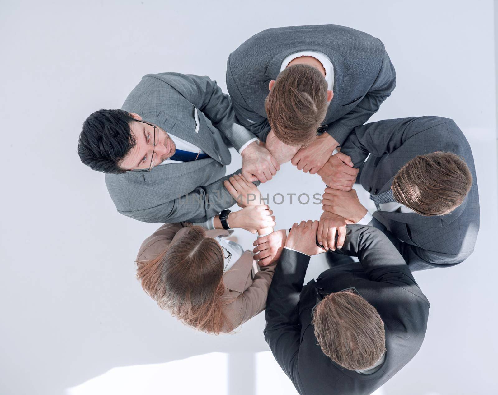 top view .business team standing in a circle .the concept of teamwork