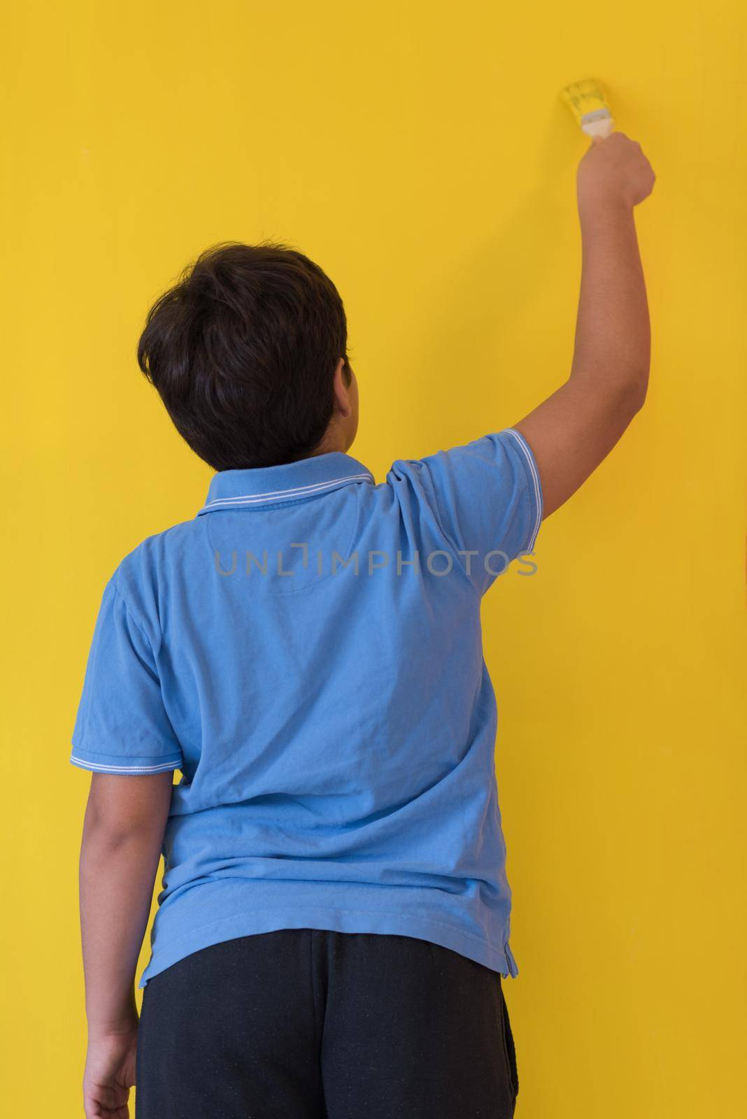 Portrait of a happy young boy painter by dotshock