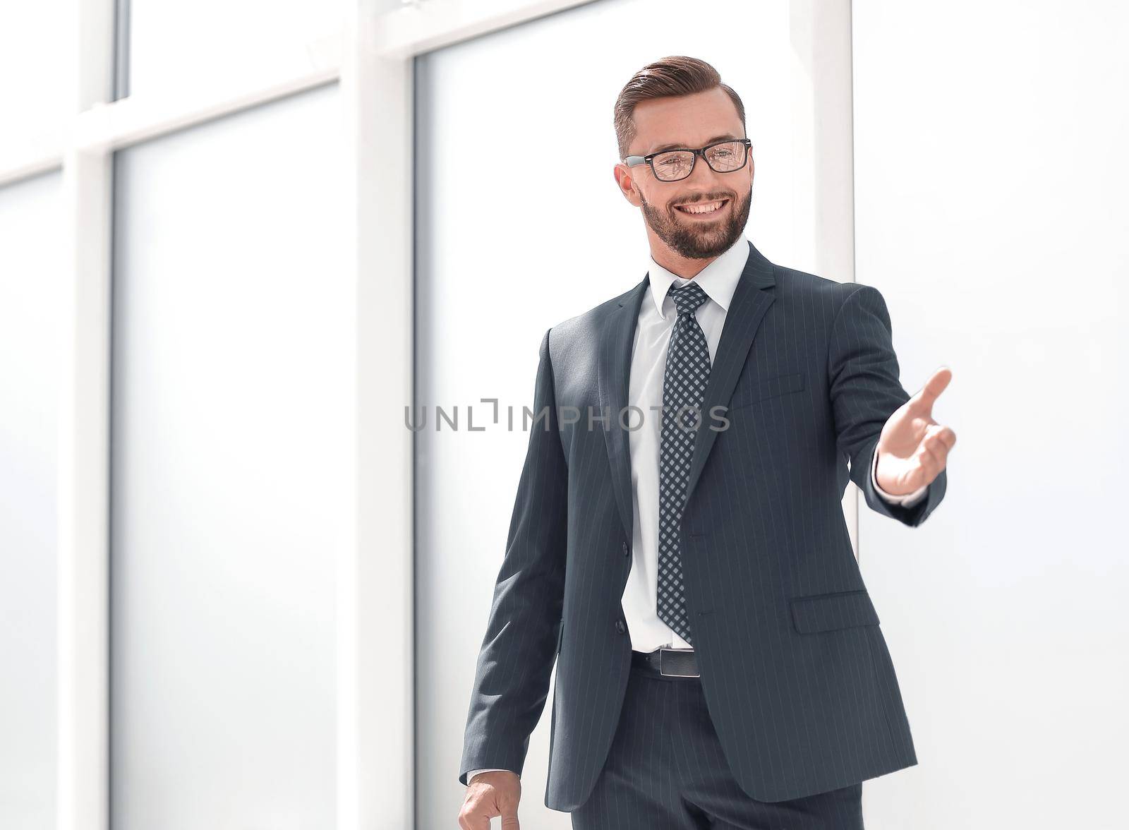 confident businessman pointing at you by asdf