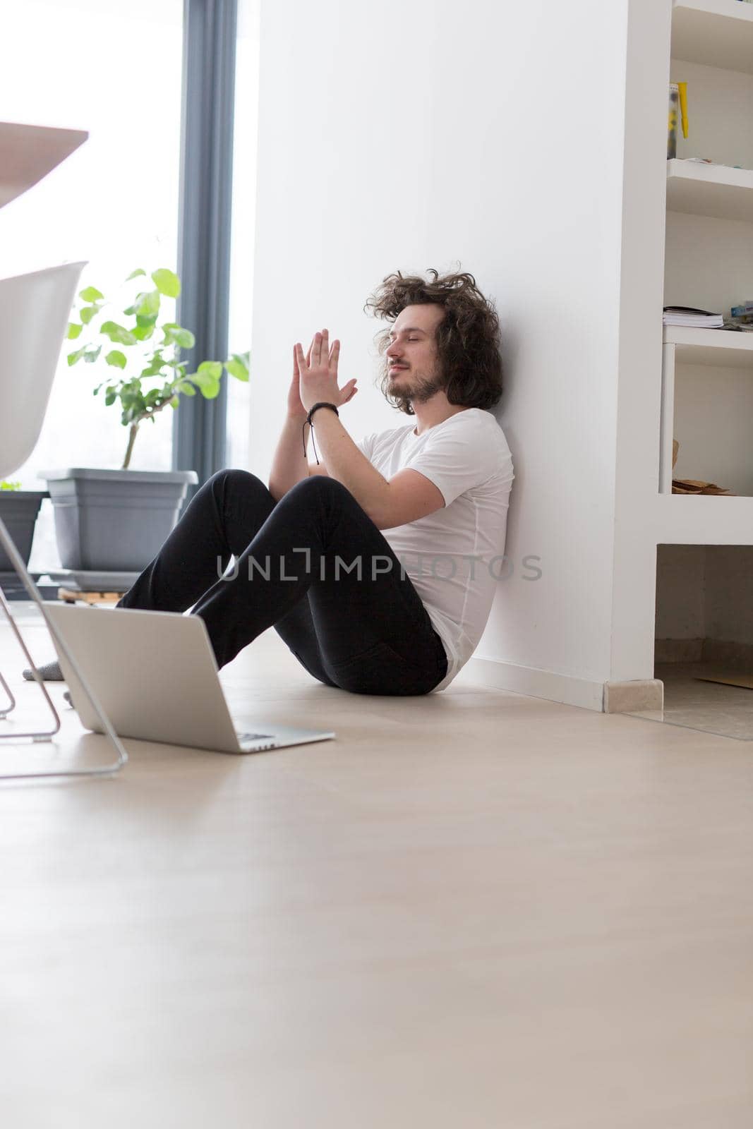 Real man Using laptop on the floor At Home  Enjoying Relaxing