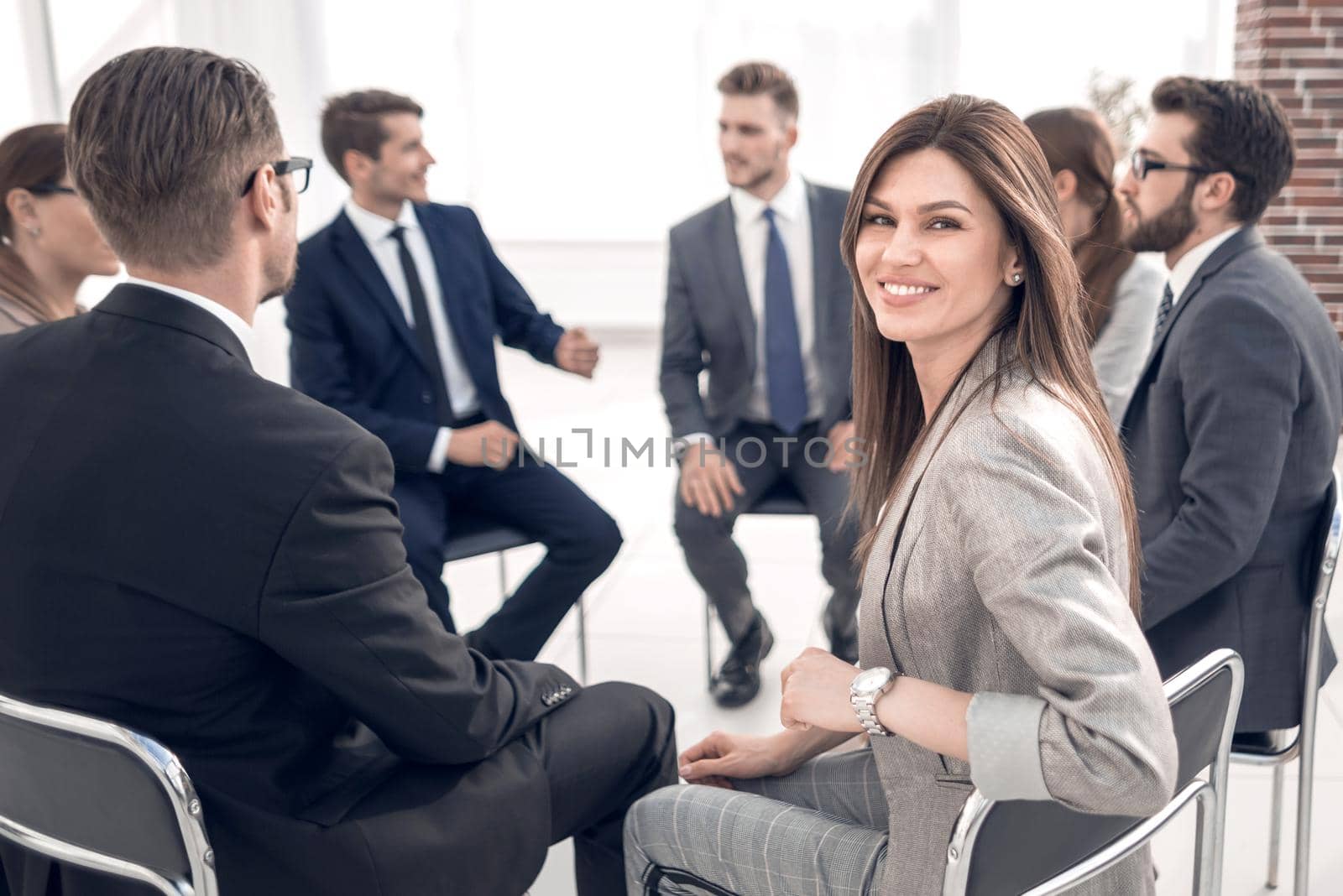 young business woman at a business meeting with the business team.photo with copy space