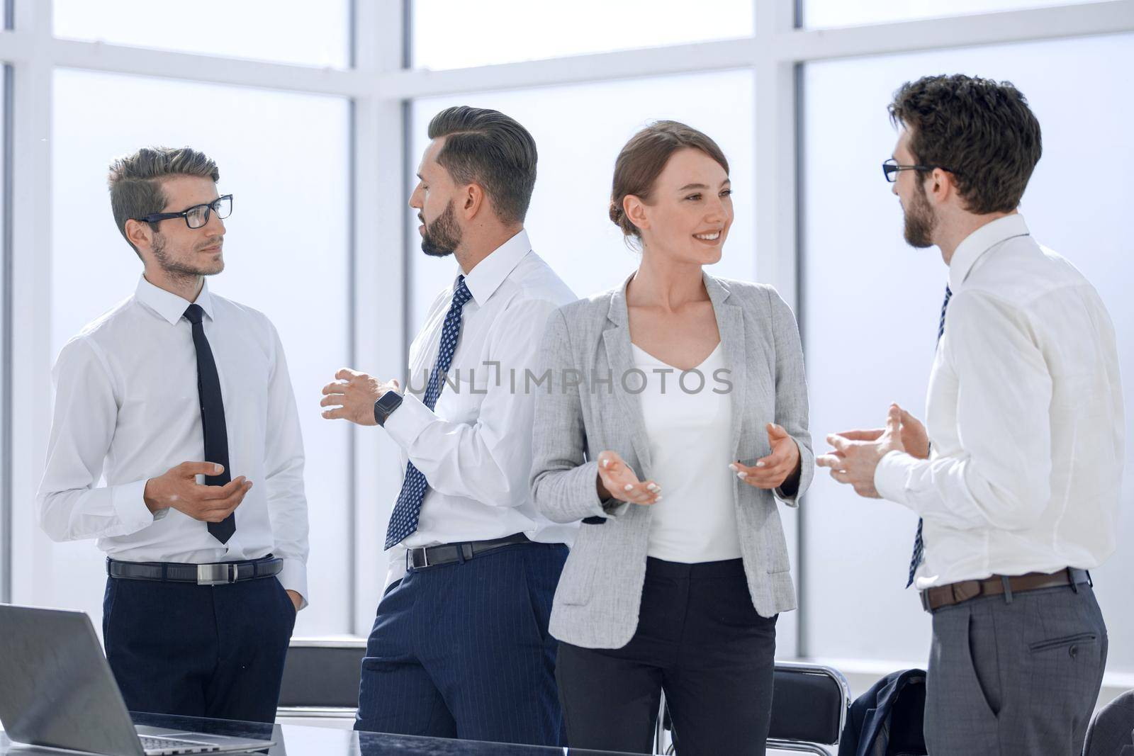 company employees discussing in the workplace .office weekdays