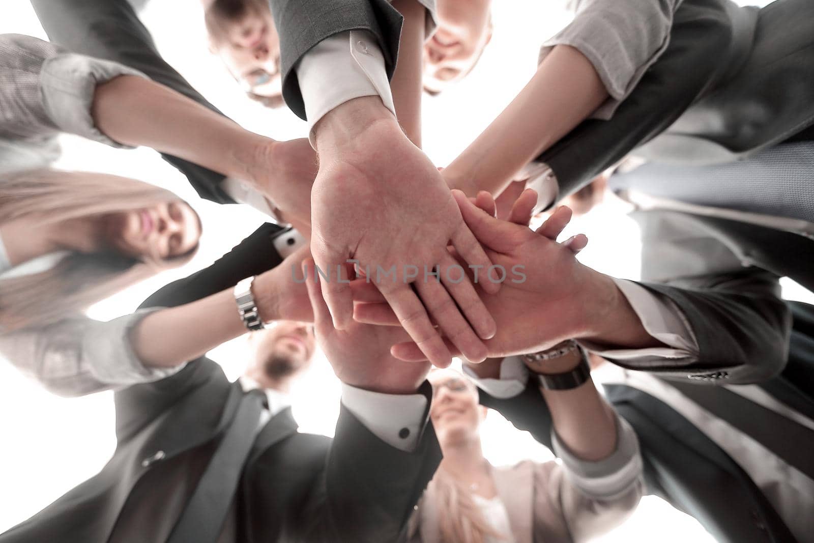 bottom view.the business team shows its unity.the concept of teamwork