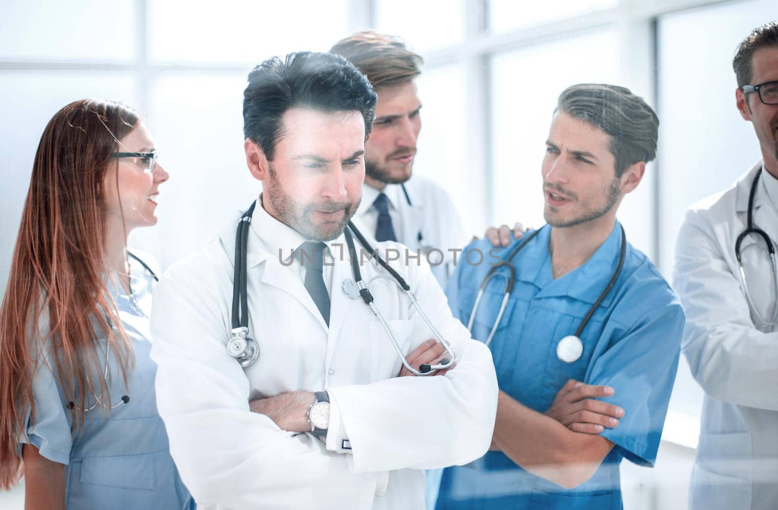 group of doctors looking at the computer screen in the meeting room