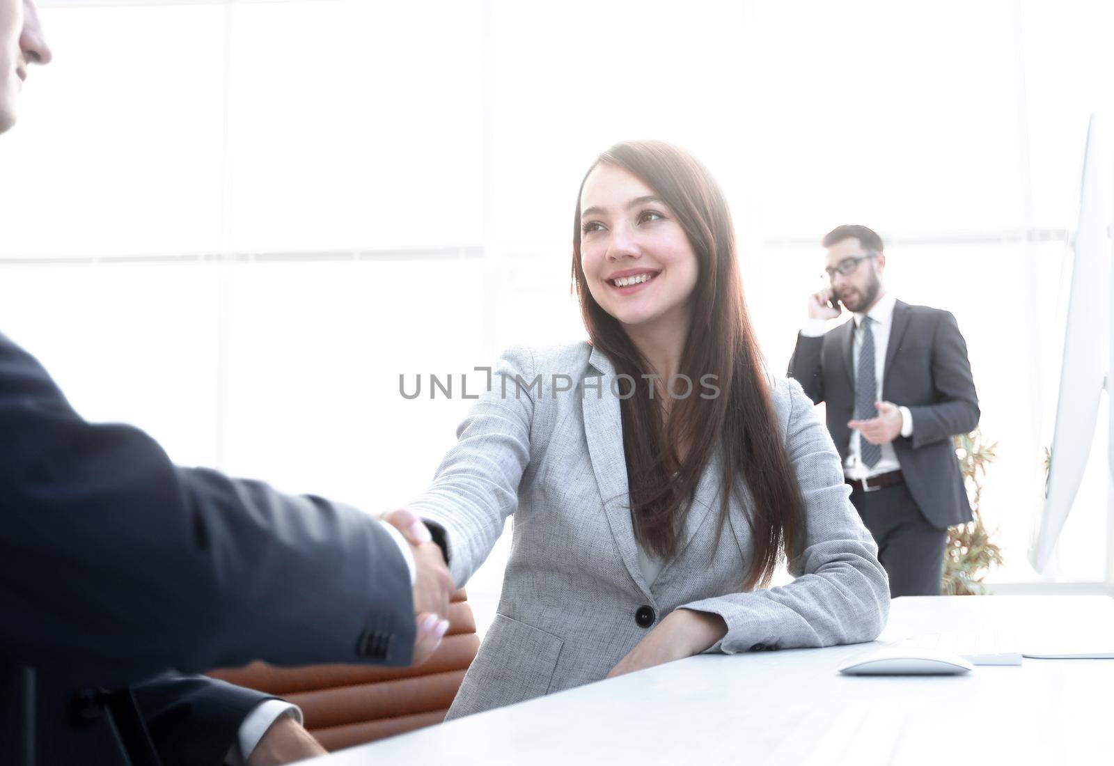 female consultant greeting the customer .photo with copy space.