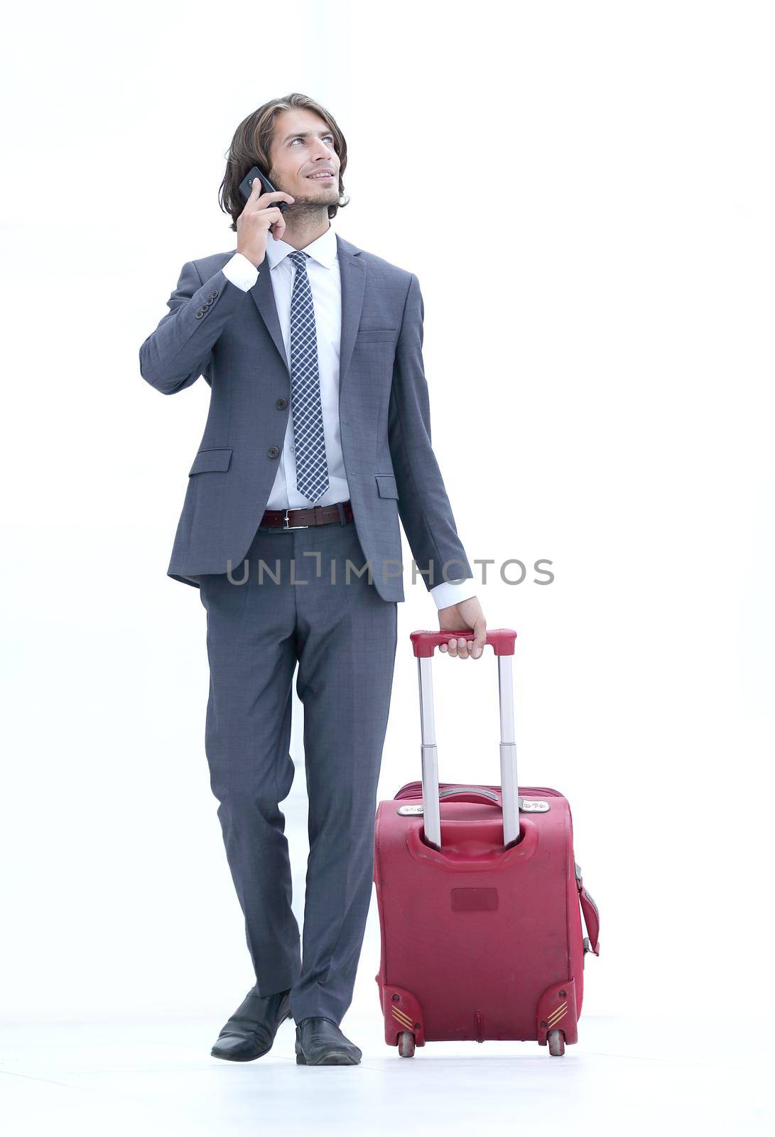 successful businessman with travel suitcase by asdf