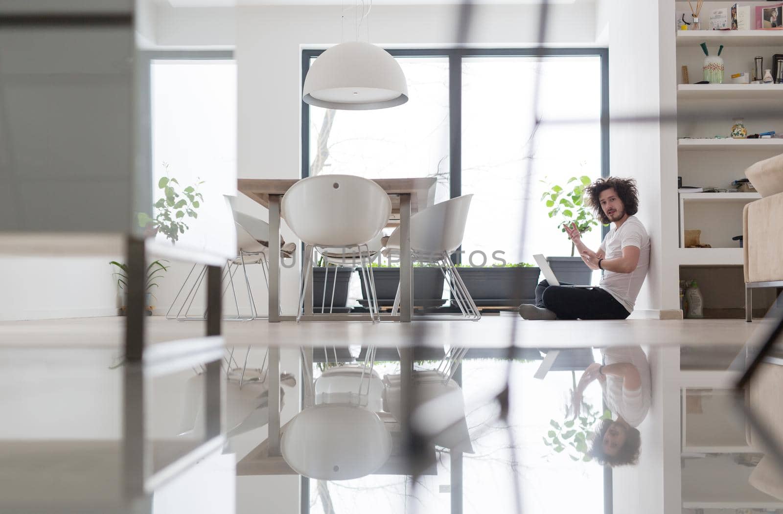 Real man Using laptop on the floor At Home  Enjoying Relaxing