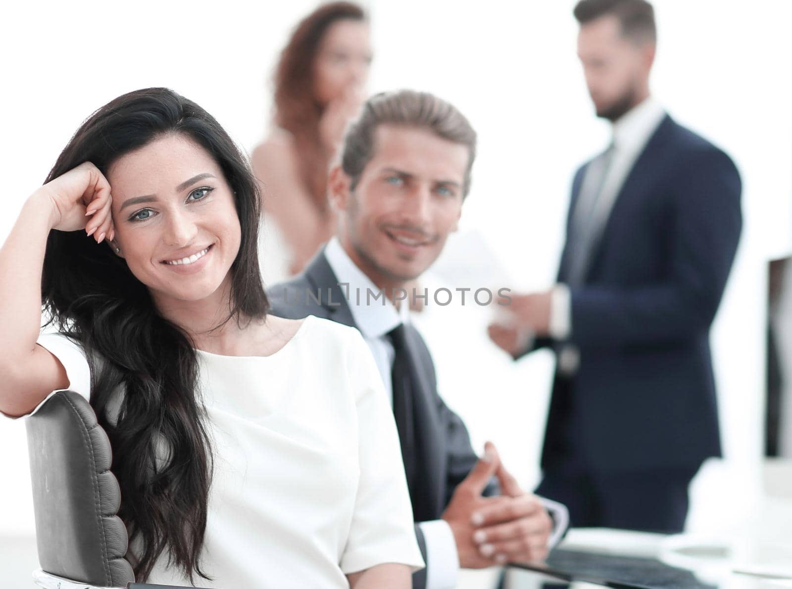 young business woman and her colleagues by asdf
