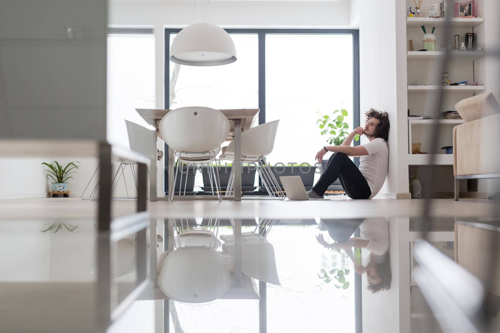 Real man Using laptop on the floor At Home  Enjoying Relaxing