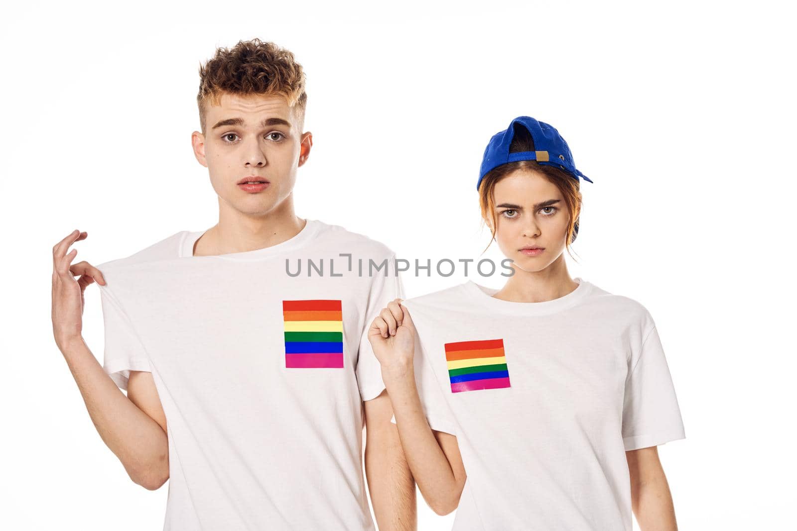 young couple in white t-shirts Flag lgbt transgender sexual minorities by Vichizh