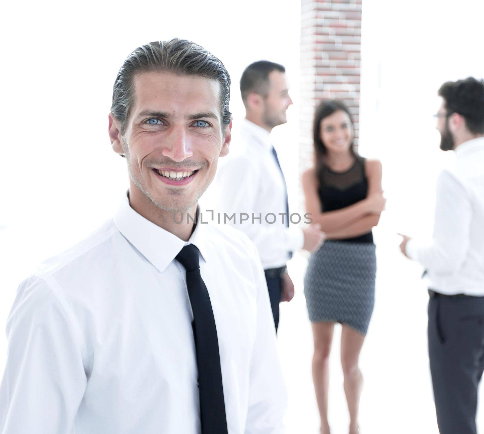 portrait of successful businessman on blurred background by asdf