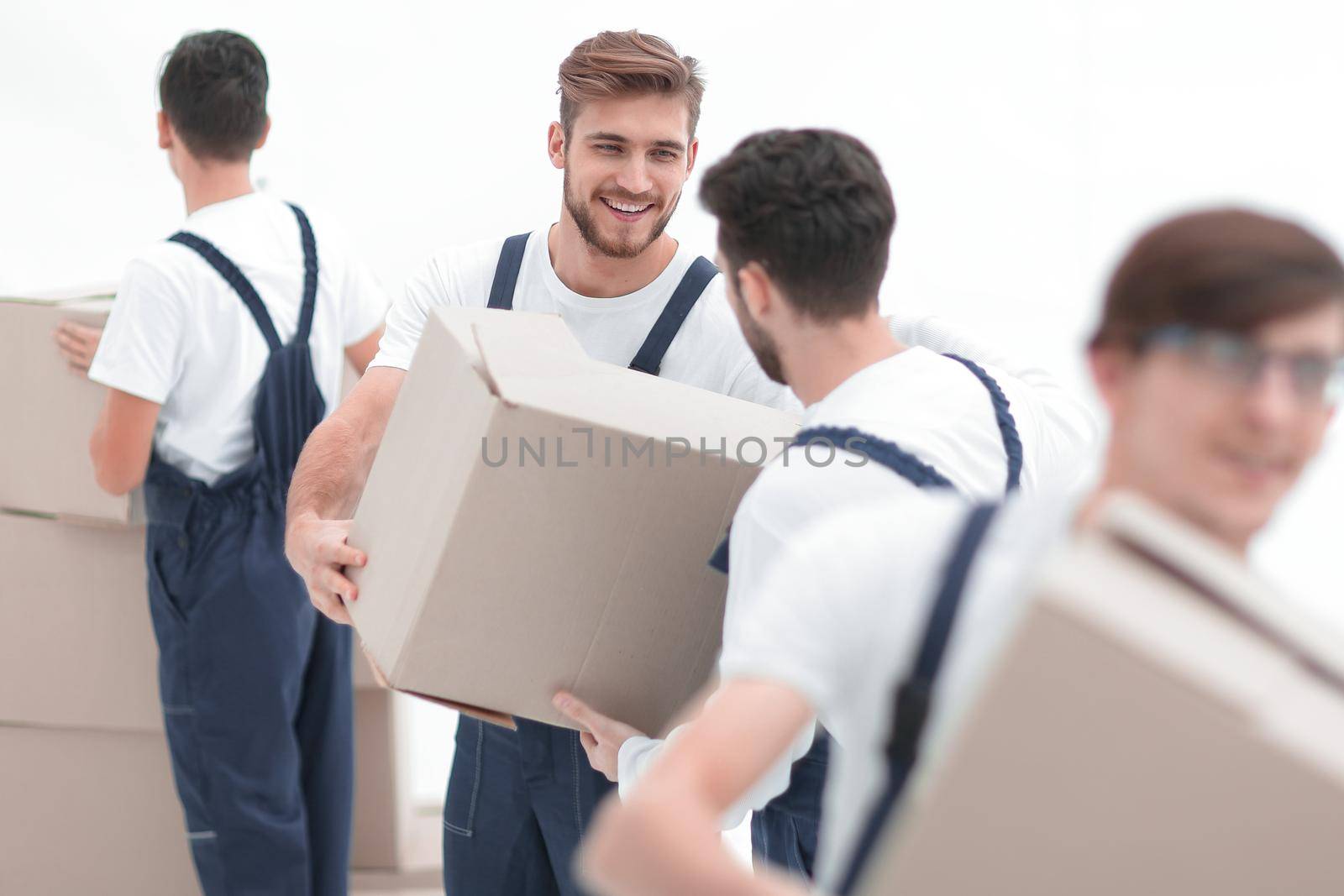 Men delivering box isolated on white