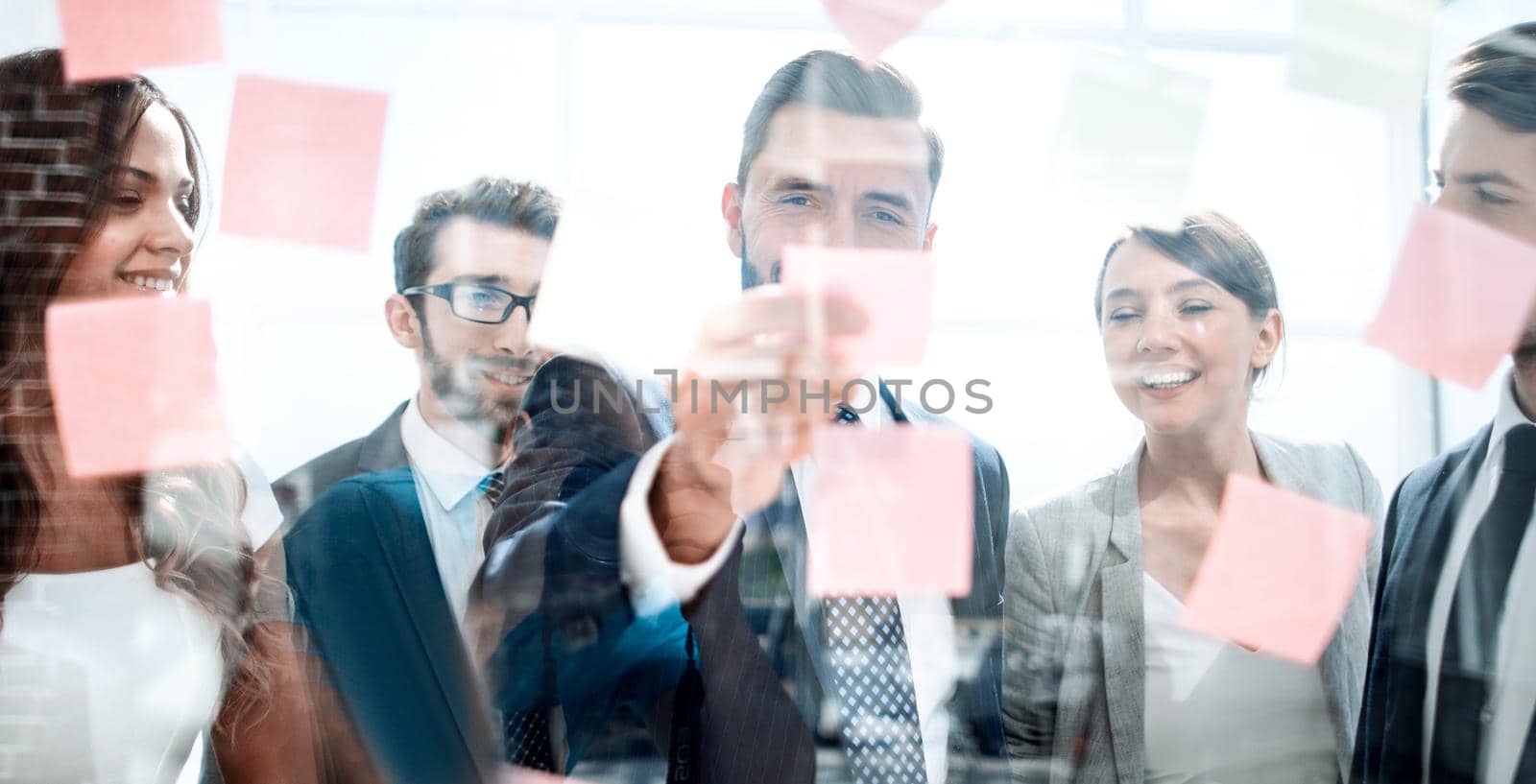 bottom view.businessman reading notes on the table. business concept