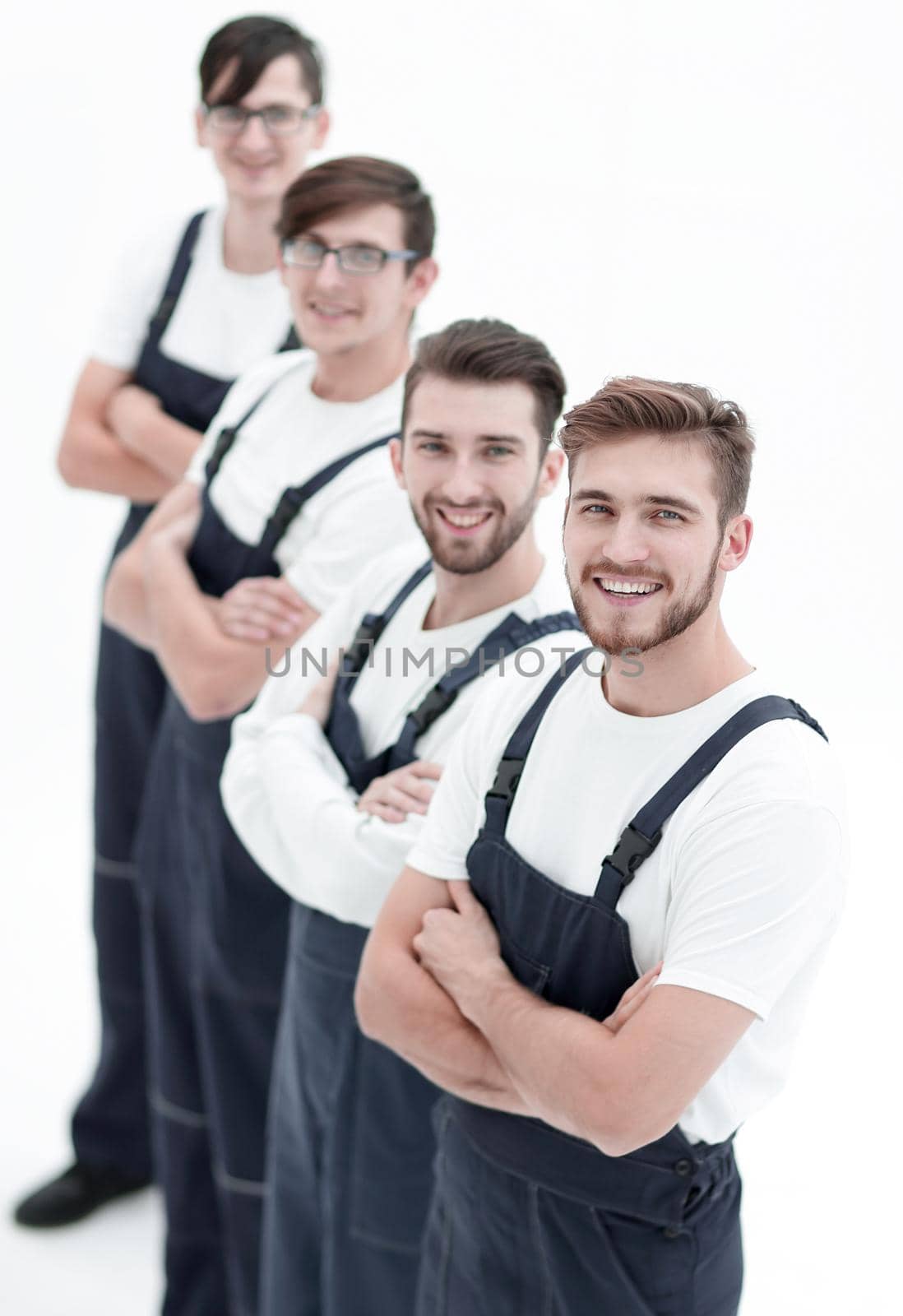Group of professional industrial workers. Isolated over white background.