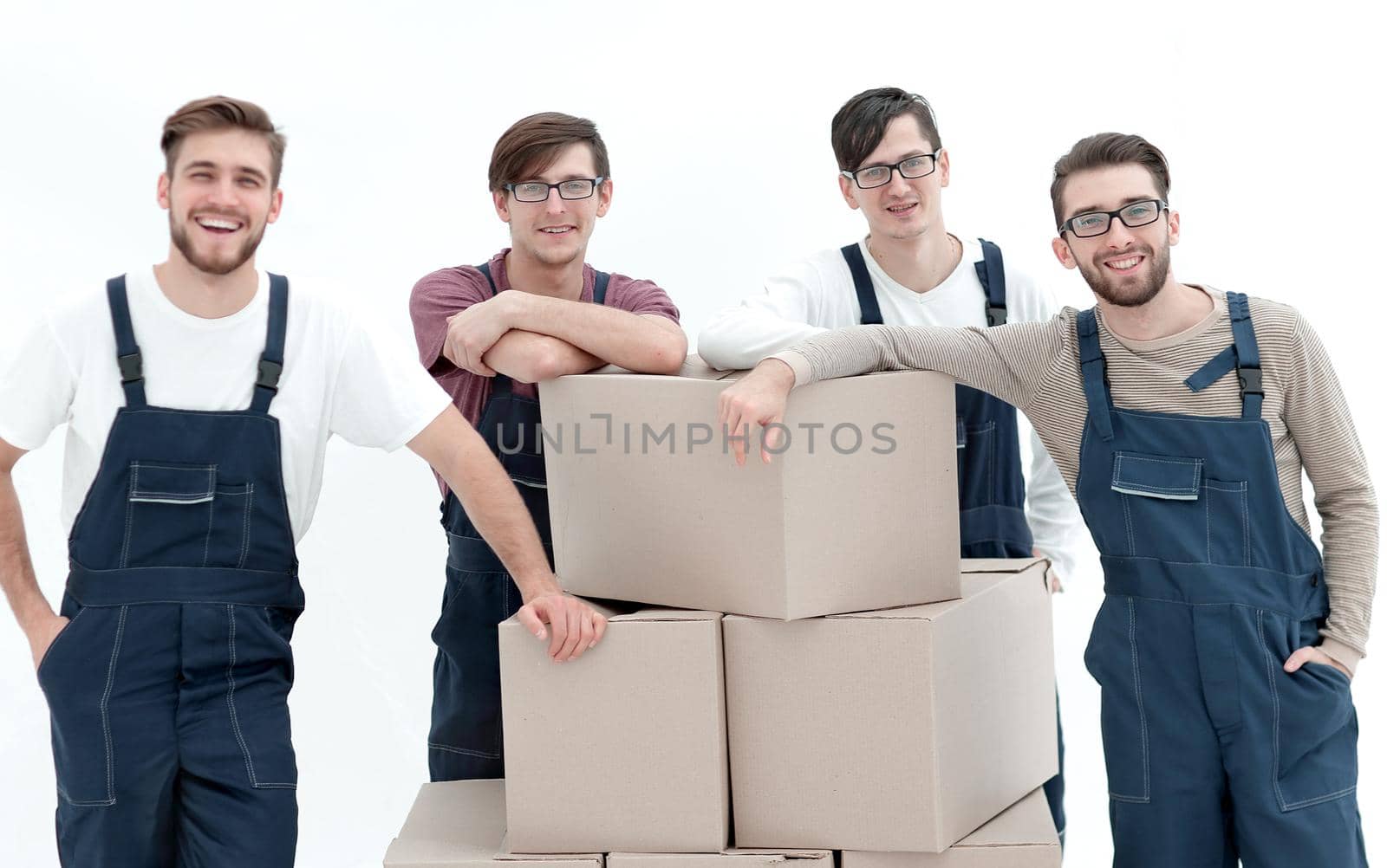 Men holding pile of carton boxes isolated on white background by asdf