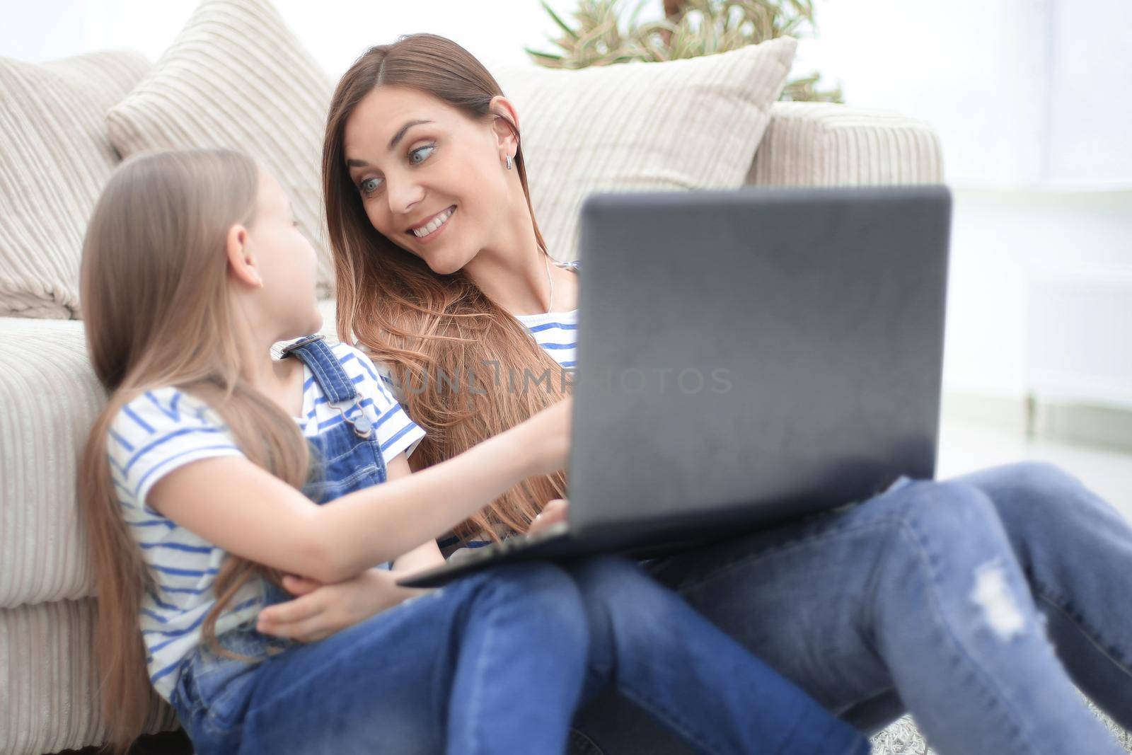 mother and daughter spend their free time together by asdf