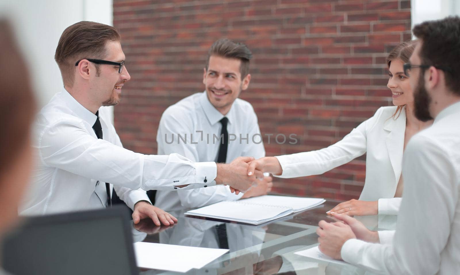 smiling Manager shaking hands with customer.concept of partnership
