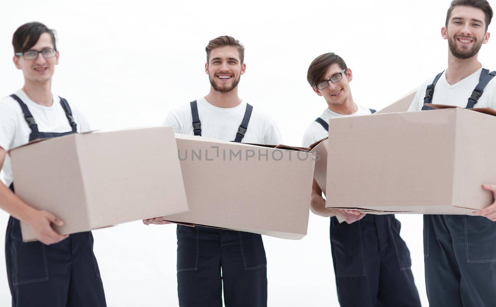 photo workers holding boxes when moving flats, by asdf