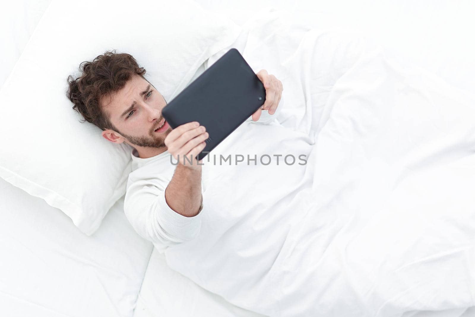 background image . man reading on digital tablet. photo with copy space.