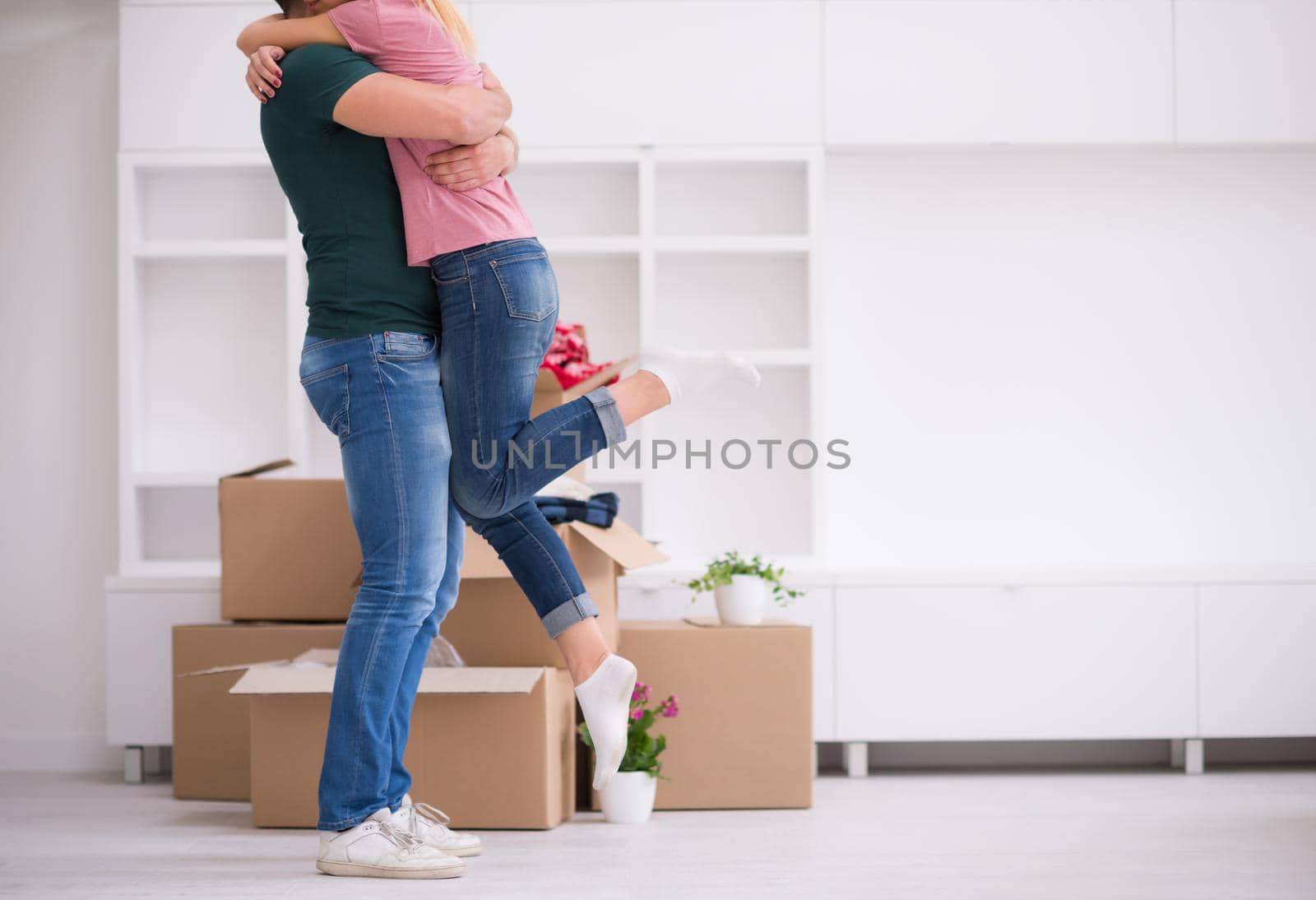 excited happy young couple looking forward to moving into a new home