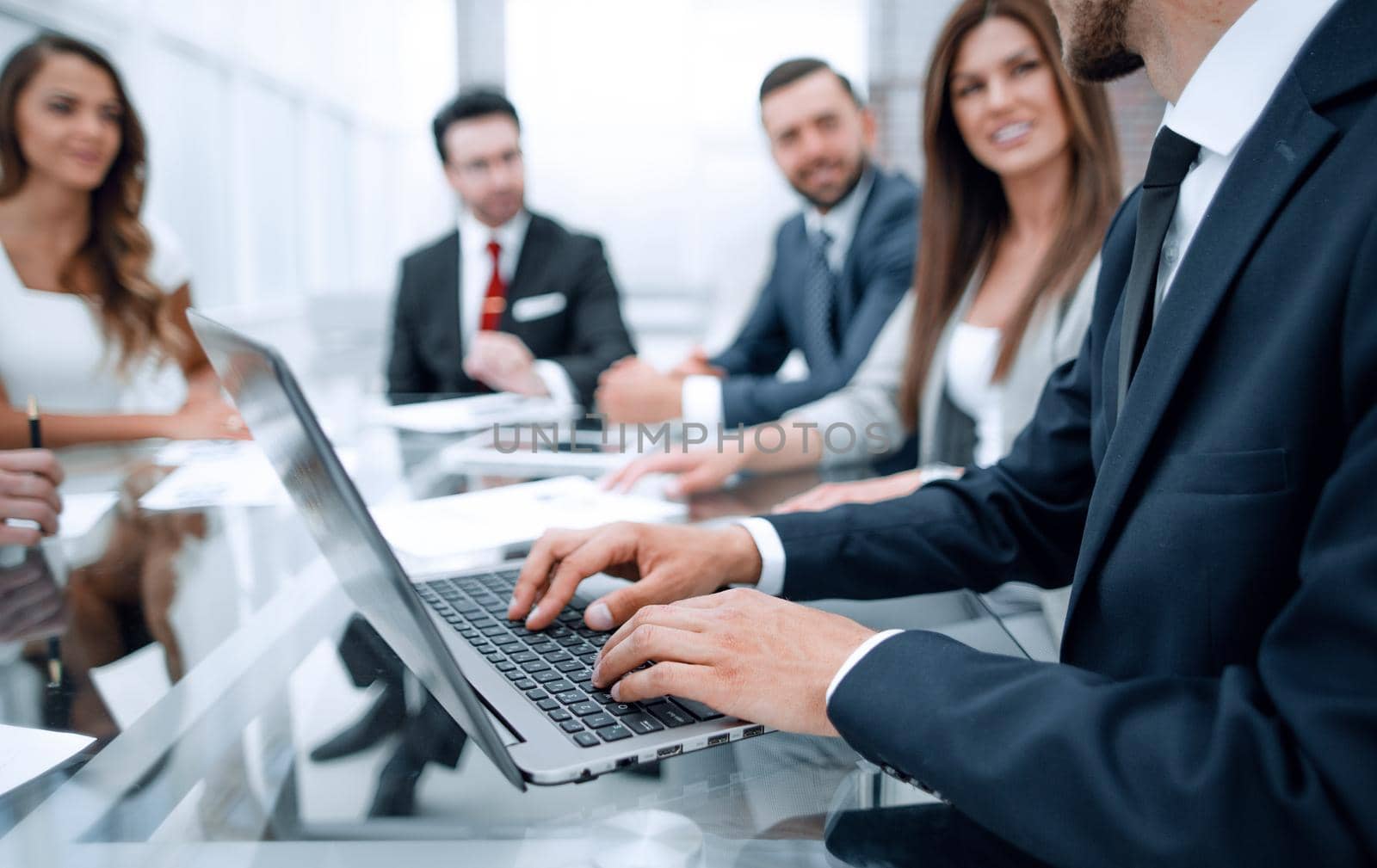 Businessman using laptop during a meeting of the Board of Directors.people and technology