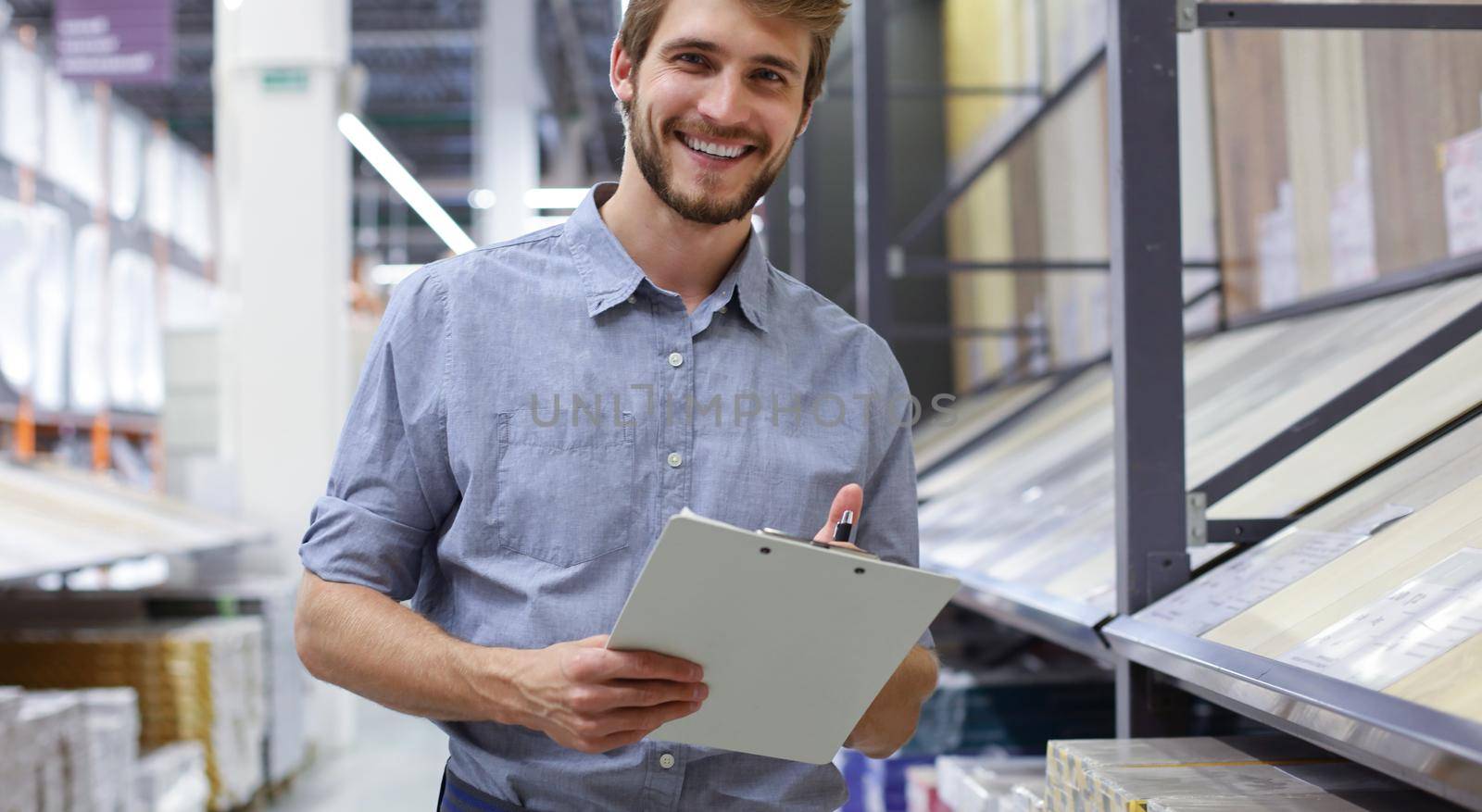 Manager use his tablet for online checking products available