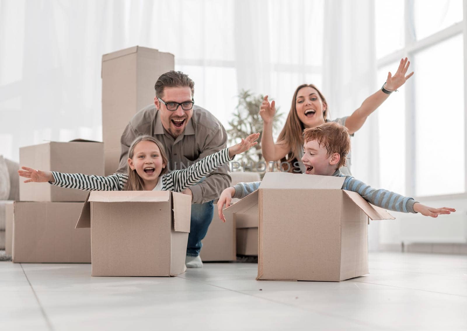 happy family having fun in a new apartment.photo with copy space