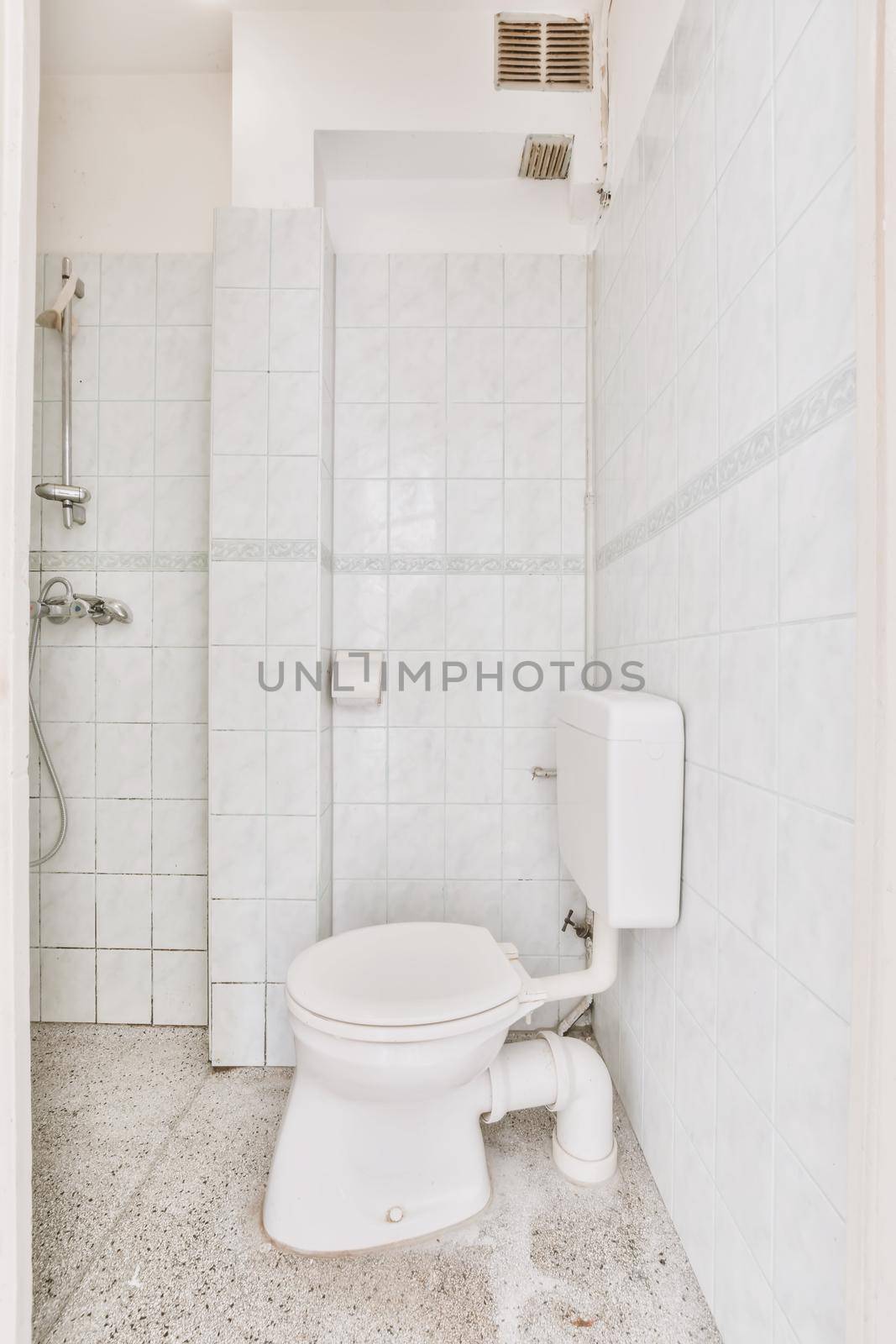 Interior of bathroom with toilet and shower