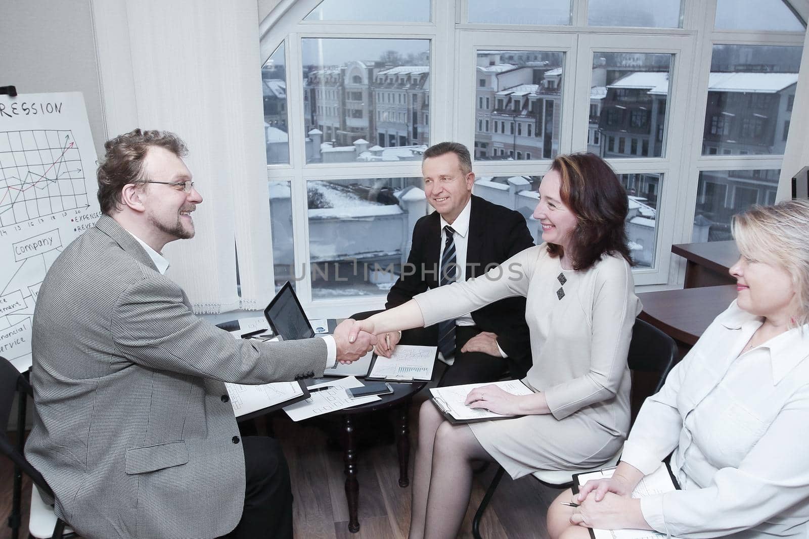 business team welcomes the business partner in a business meeting.the concept of cooperation