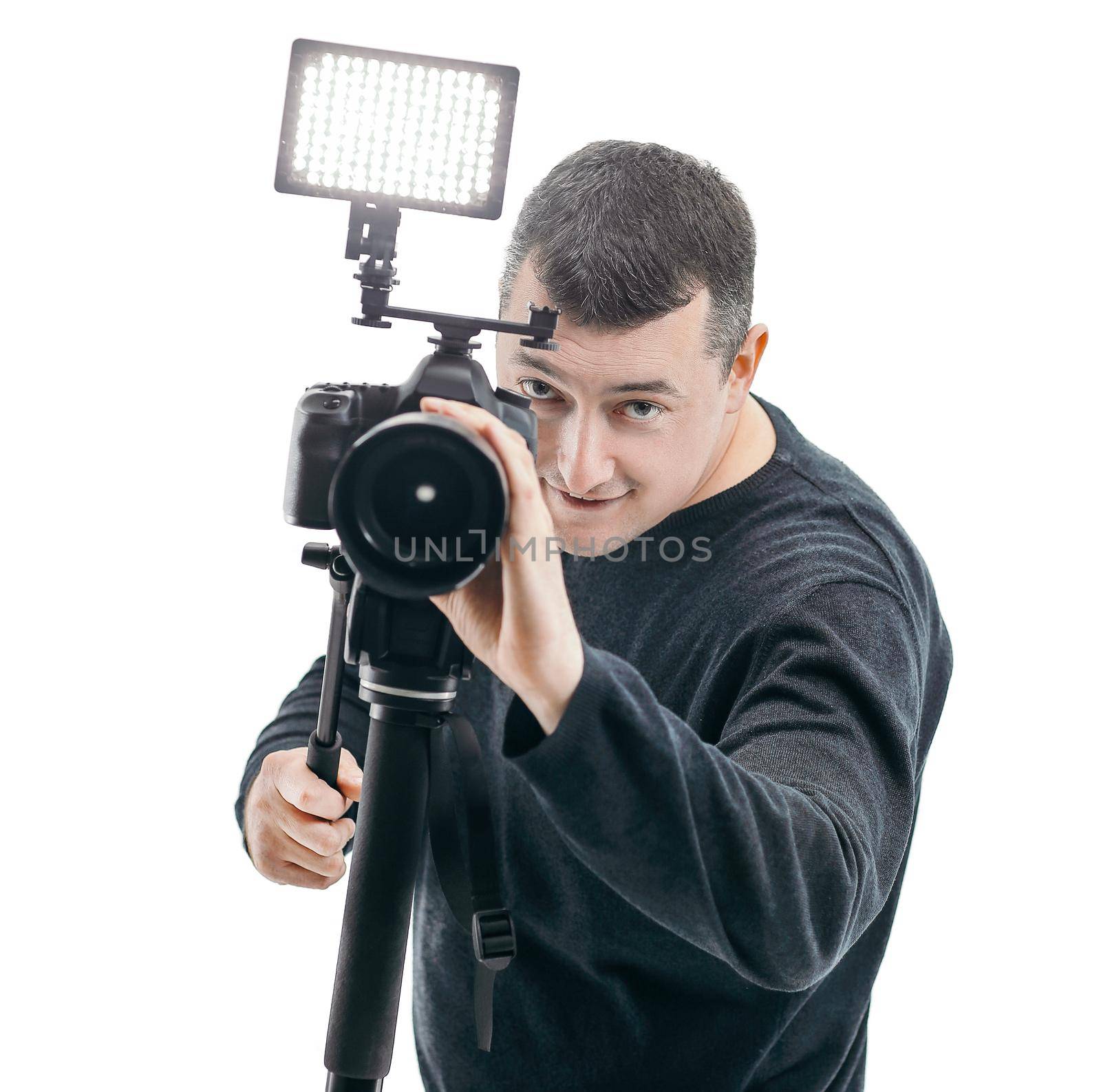 portrait of a successful photographer .isolated on white background.