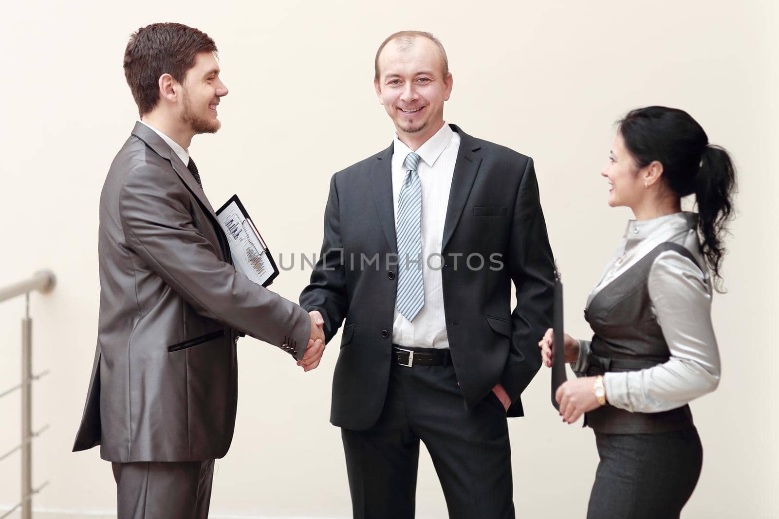close up.businessman handshake with business woman.