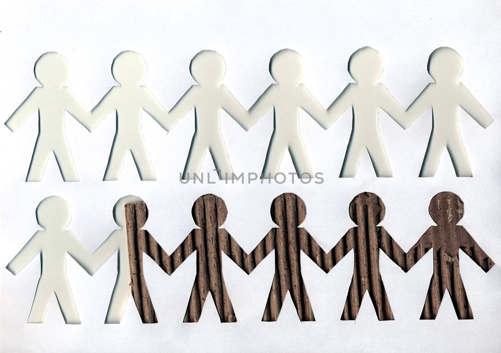light and dark paper men on white background.business concept