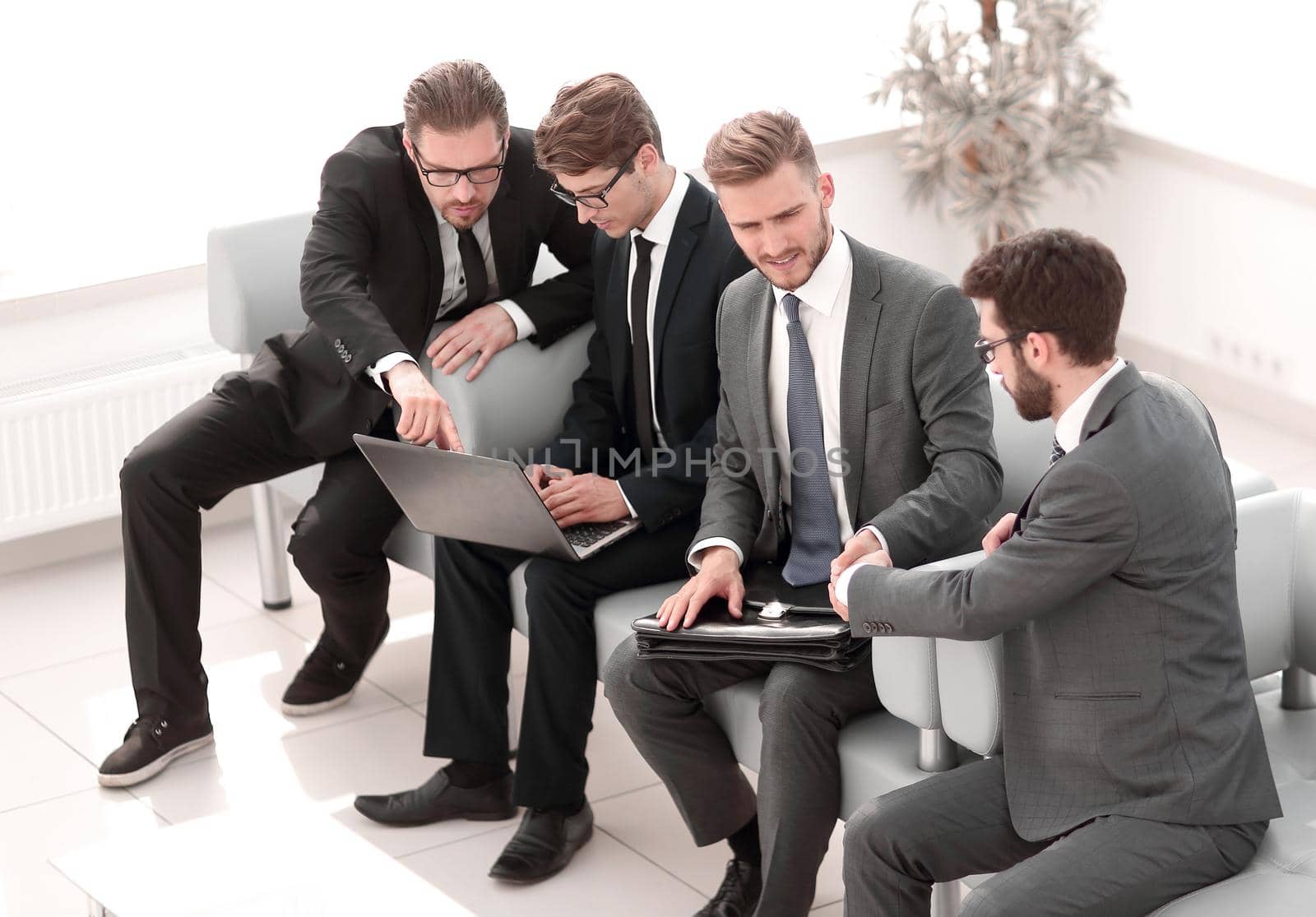 welcome and handshake of business people in office waiting room.business concept