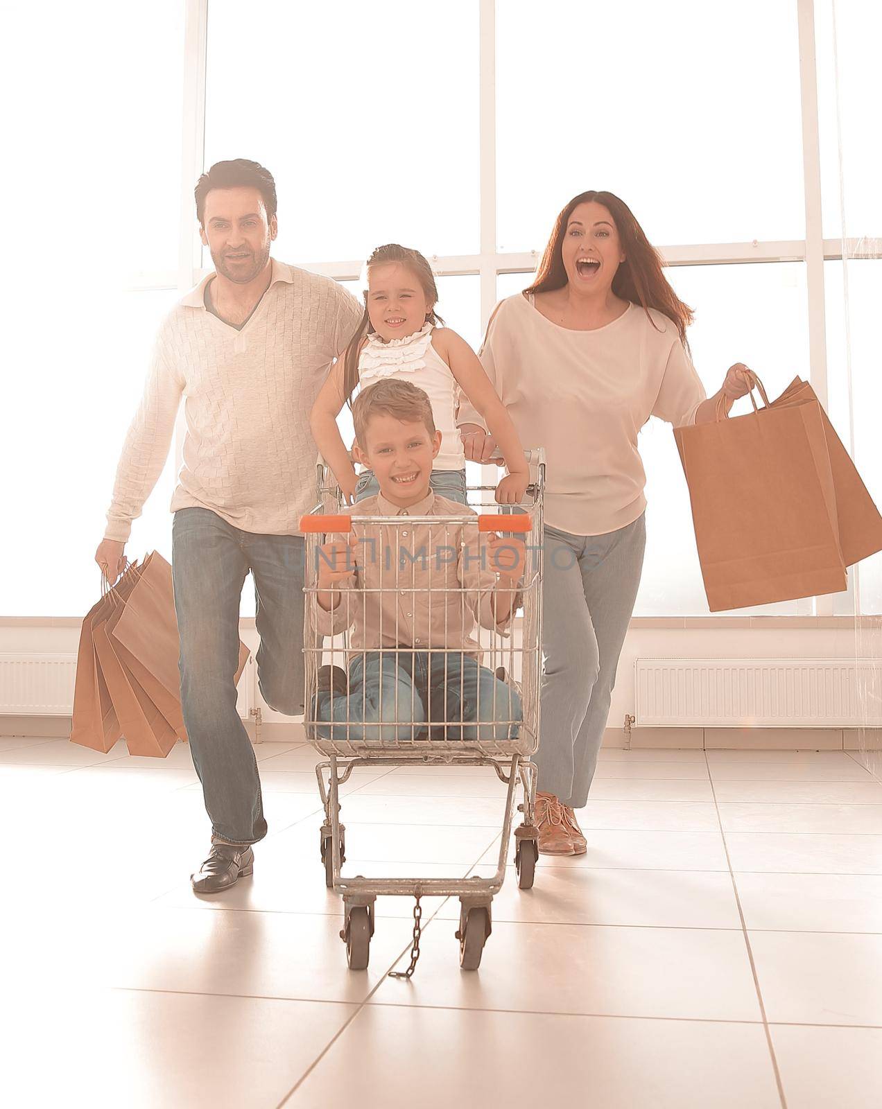 happy family in a hurry to shop.photo with copy space