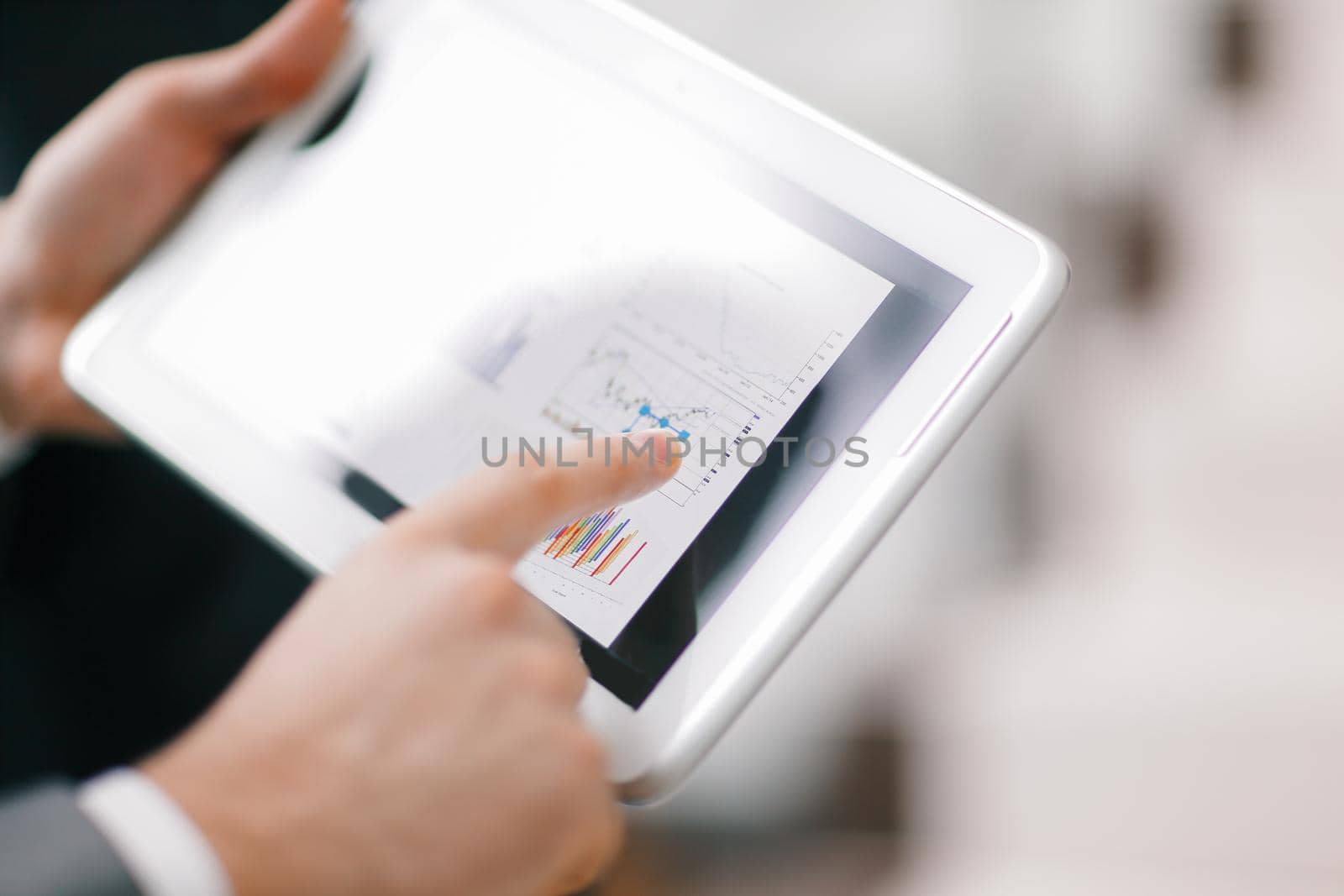 Hands of people working with tablet computer. Technology.