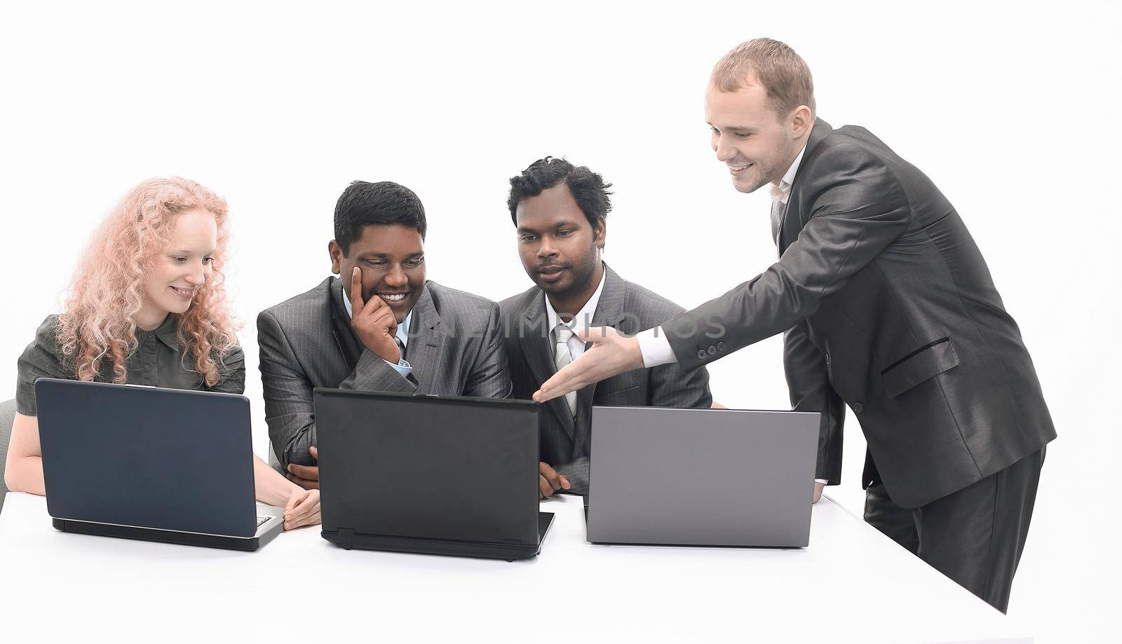 successful business team discussing the information with the laptop .isolated on white