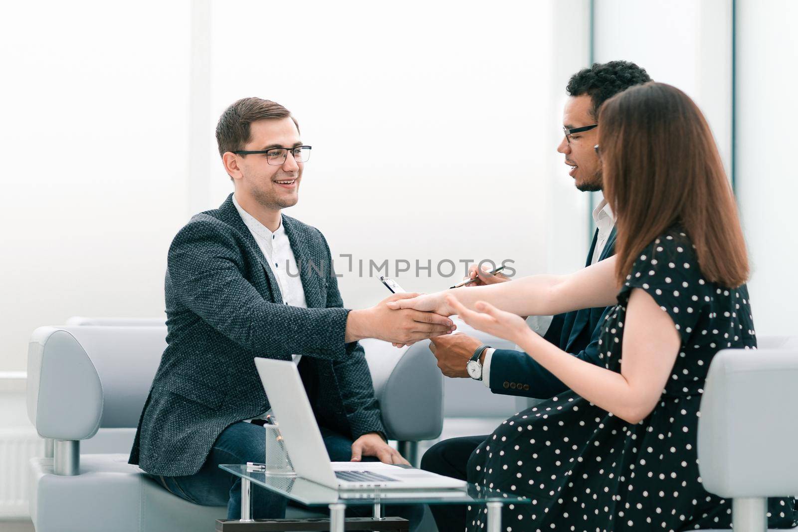 business people shaking hands after a business meeting . concept of cooperation