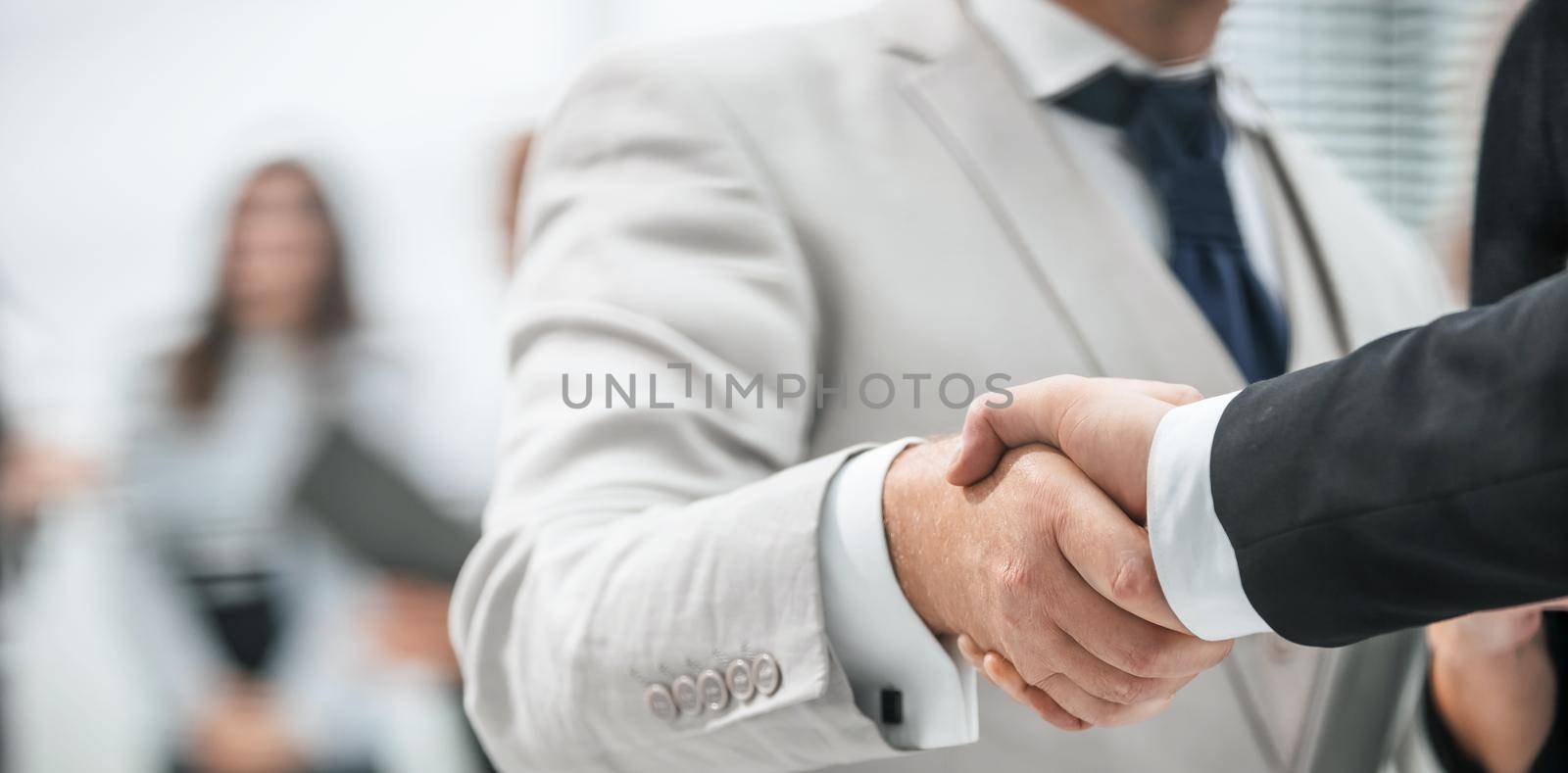 close up. business handshake on office background. concept of partnership
