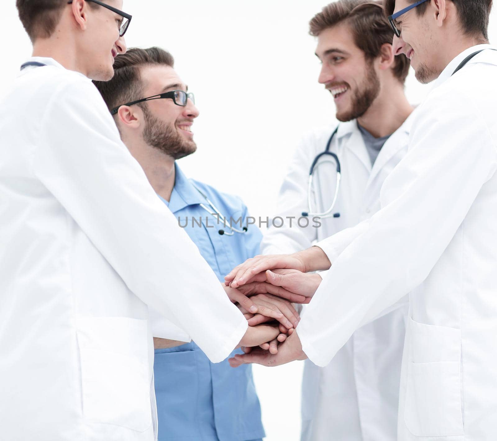 closeup.Small group of doctor team joining hands,Tagteam Concept: