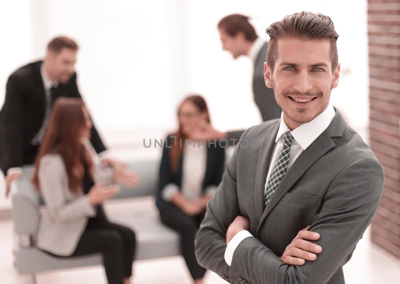 Young man in business suit smiling by asdf