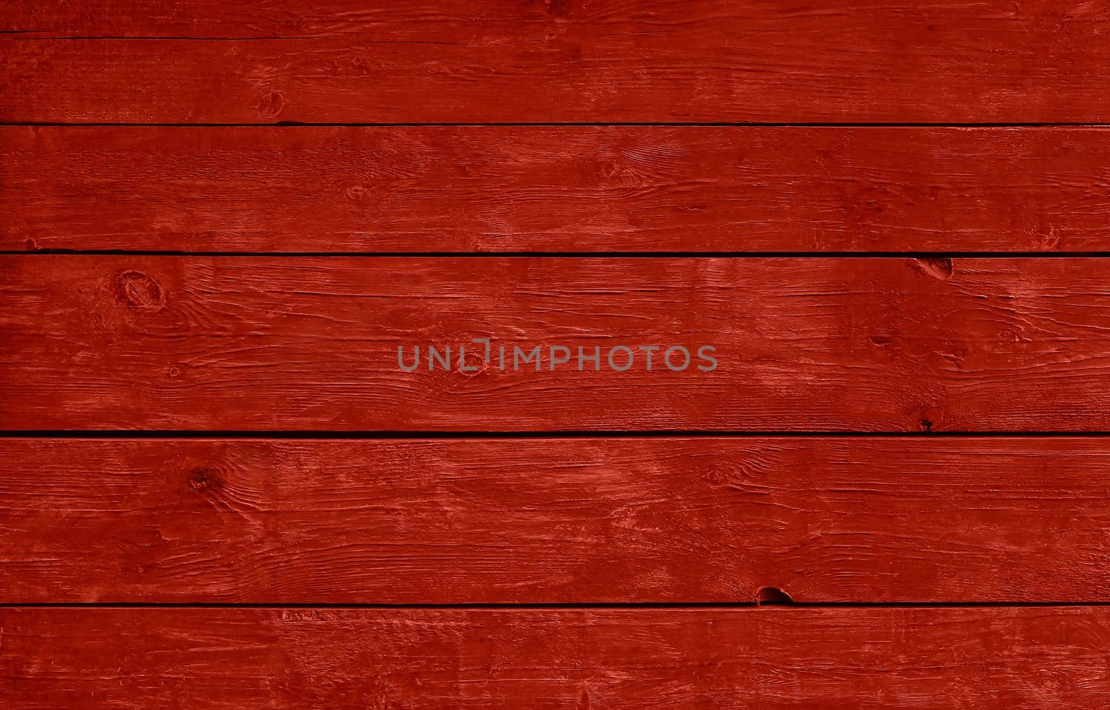 Close up background texture of red vintage weathered painted wooden planks, rustic style wall panel