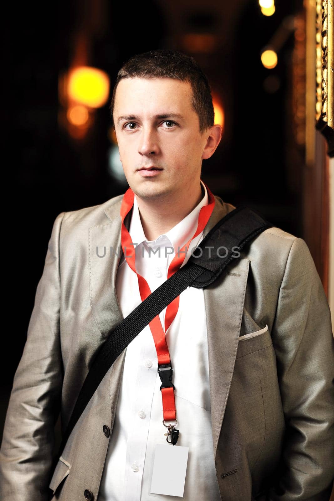 young business man portrait at night bar restaurant at conference seminar meeting