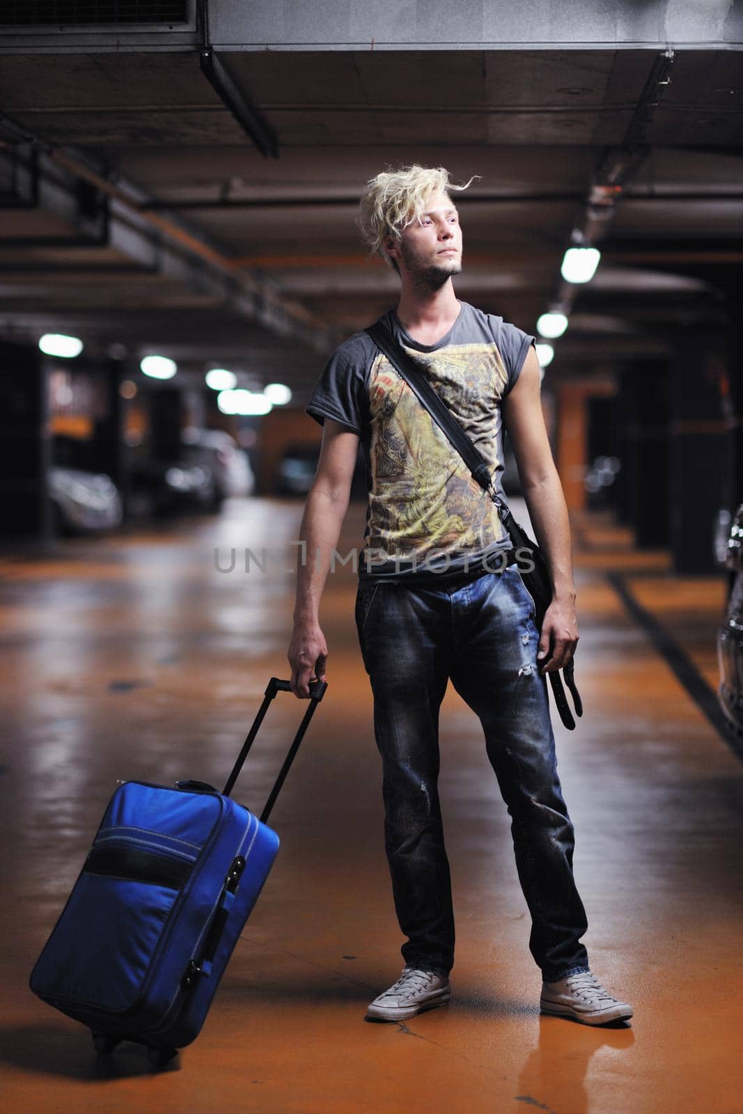 Portrait of an handsome young  man  with urban background and fashion clothes style