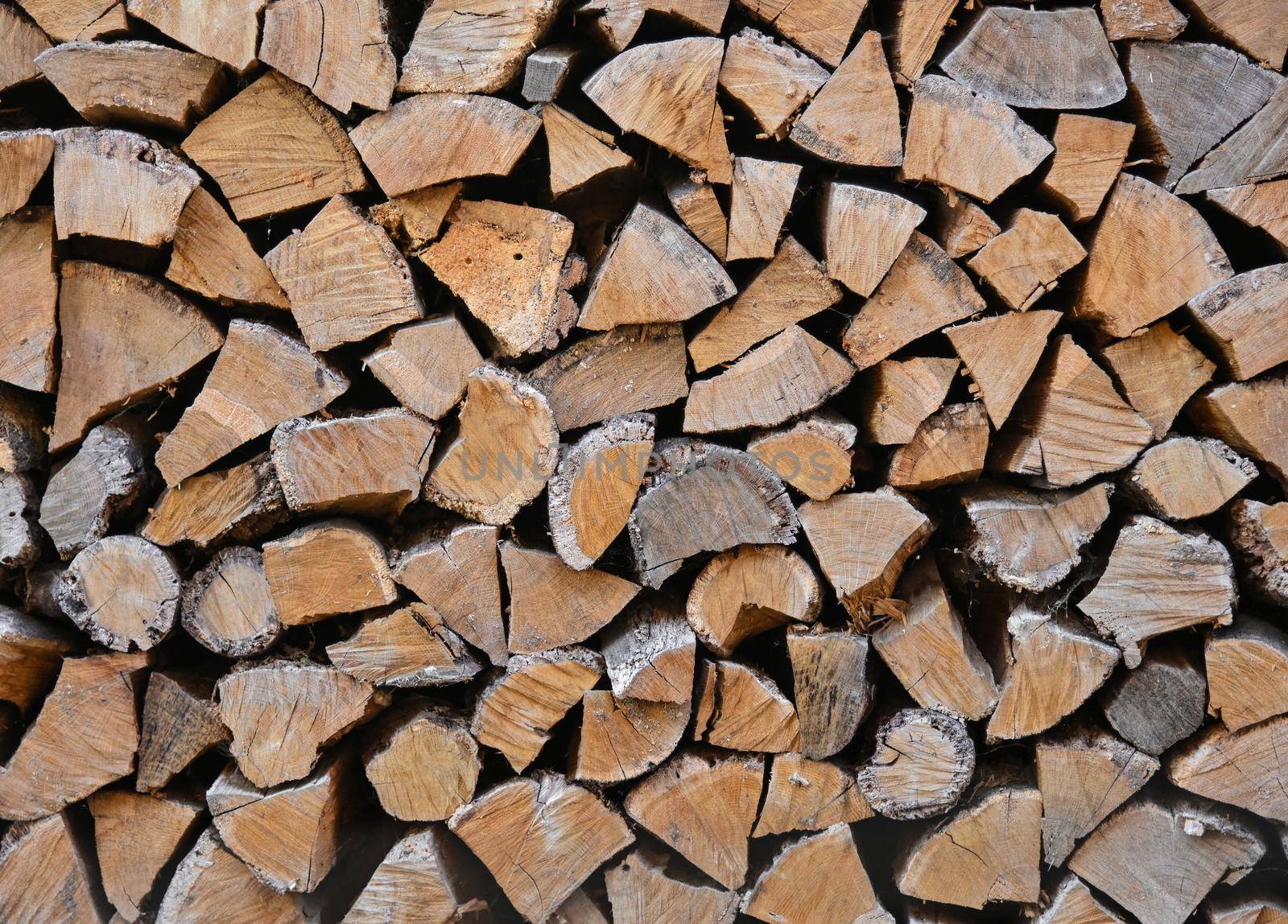 Stack pile of firewood oak wooden logs by BreakingTheWalls